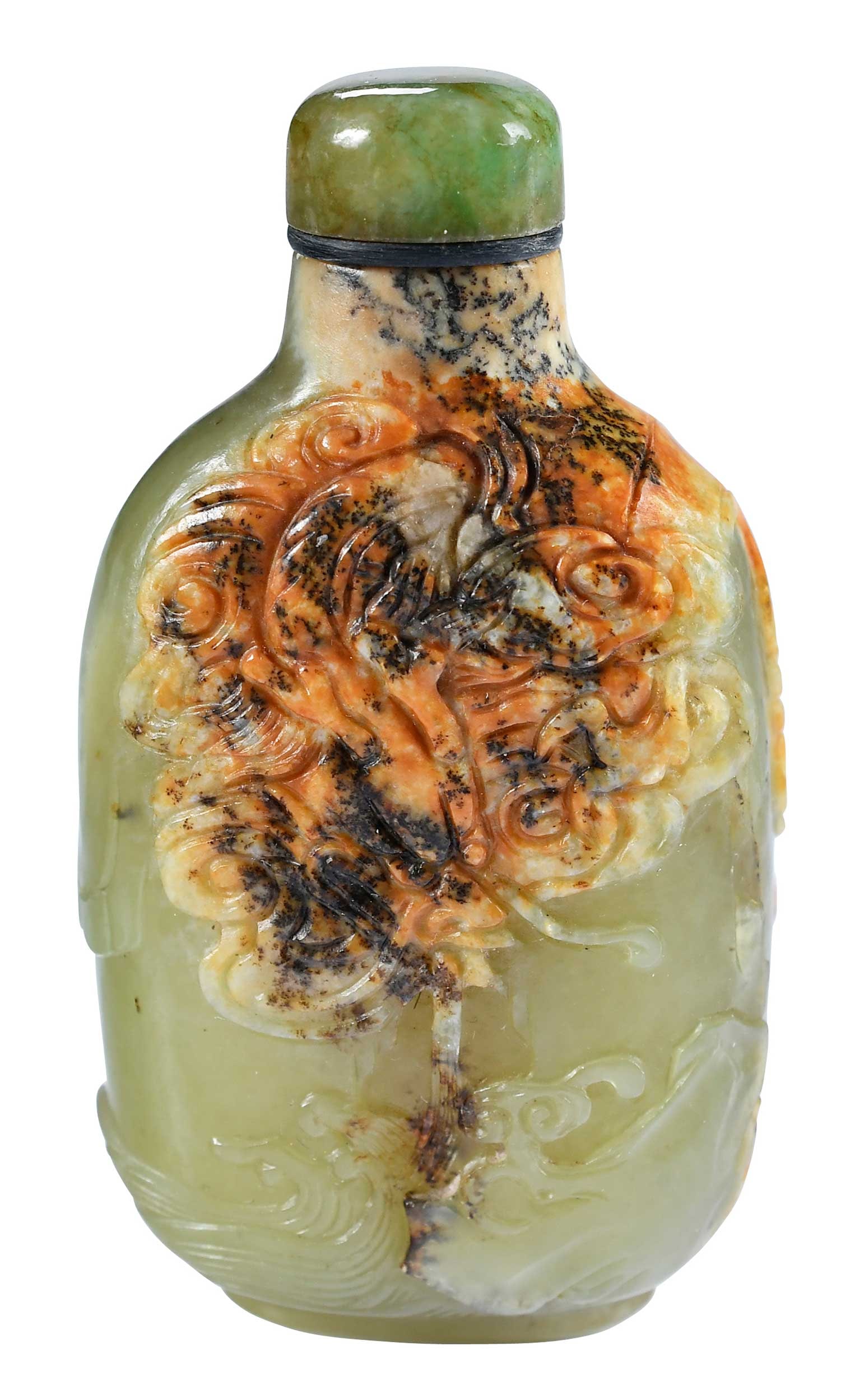 Chinese Carved Mottled Jade Snuff Bottle: milky green with russet and black inclusions, well hollowed interior, jade cap and bone spoon, 2-1/2 x 1-3/8 x 3/4 in. Provenance: The Lifetime Collection of Ronald Elliott Hasbrouck Woodaman (1937-20