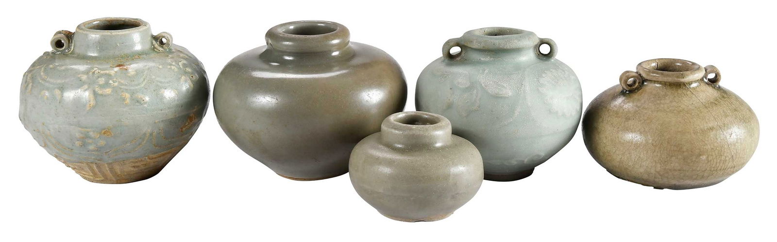 Five Asian Celadon Jarlets: possibly southeast Asian, of varying size and shade, largest 2-7/8 x 3-1/2 x 3-1/2 in.Provenance: Private Virginia Collection