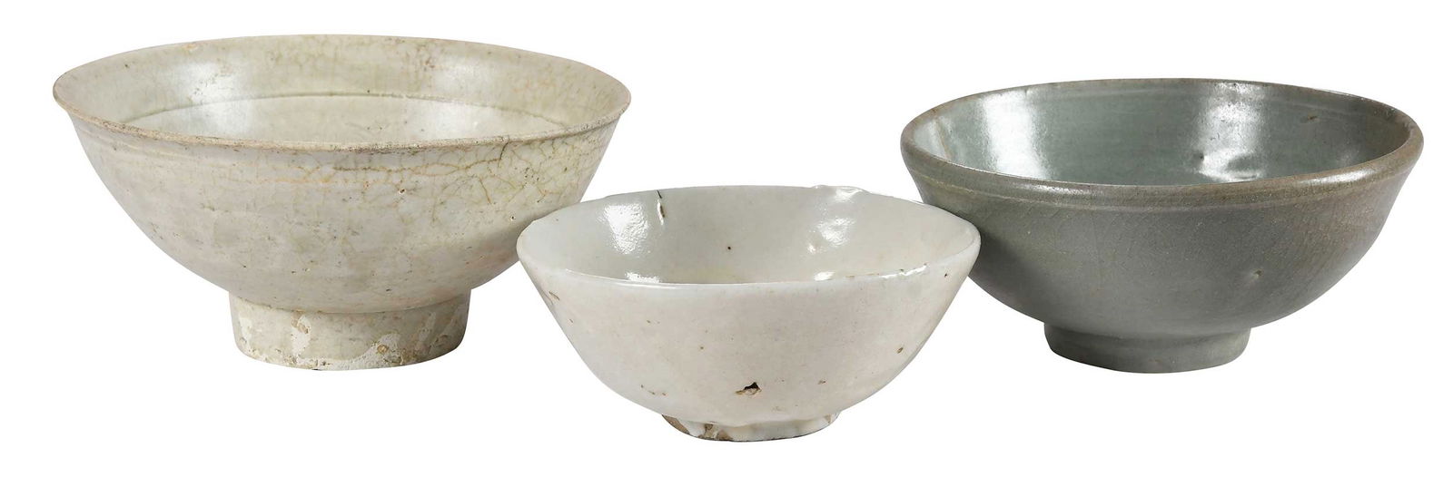 Three Chinese Celadon Bowls: possibly Song dynasty, of varying size, largest 2-7/8 x 6-1/4 x 6-1/4 in.Provenance: Private Virginia Collection