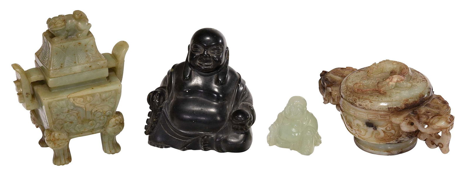 Four Chinese Carved Hardstone Sculptures and Censers: 19th/20th century, comprising: green censer with cover, foo dog finial, 6-3/4 x 5-1/2 x 3-1/4 in.; censer with cover and dragon-head handles, 3-1/2 x 7-1/4 x 4-1/2 in.; black Buddha, 5 x 4-3/4 x 2-5/8