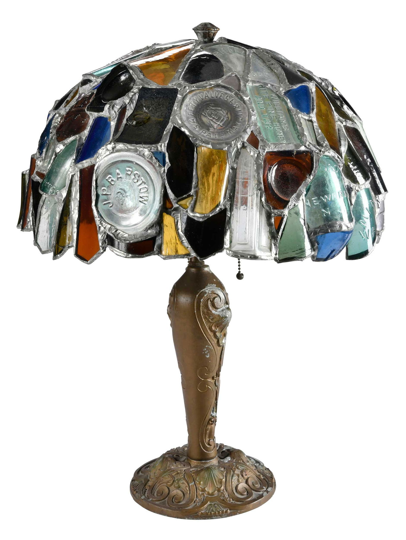 Table Lamp with Leaded Glass Shade: wired for electricity, bronze painted body, apparently unmarked, 21-3/4 x 6-7/8 x 6-7/8 in.; leaded shade made of broken colored glass pieces, some from bottles, 9-1/2 x 17 x 17-1/4 in. Provenance: Pr