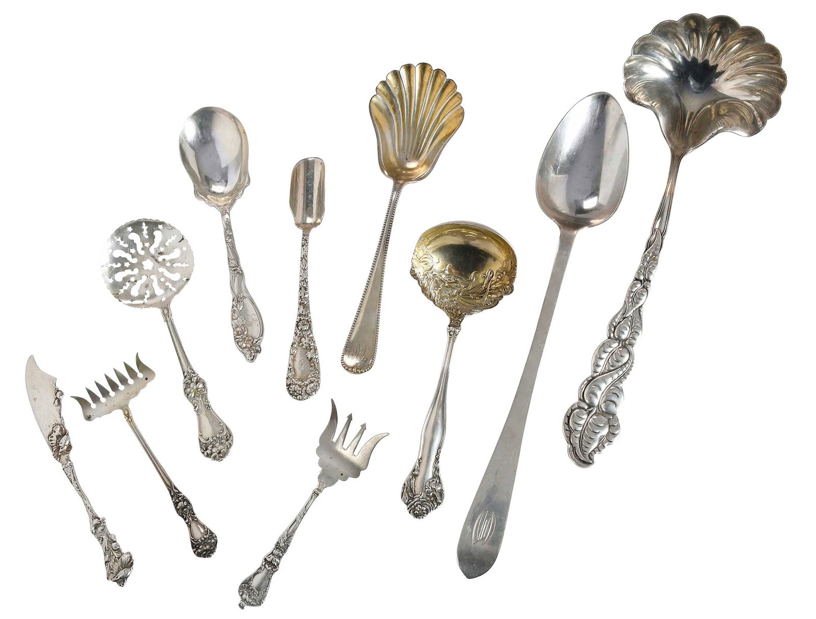 19 Assorted Sterling Serving Pieces: American, 20th century, including Durgin Imperial Chrysanthemum cheese scoop; Tiffany Atlantis style ladle; large stuffing spoon; hollow handle salad set; serving spoon; bon bon; bacon fork; sardine