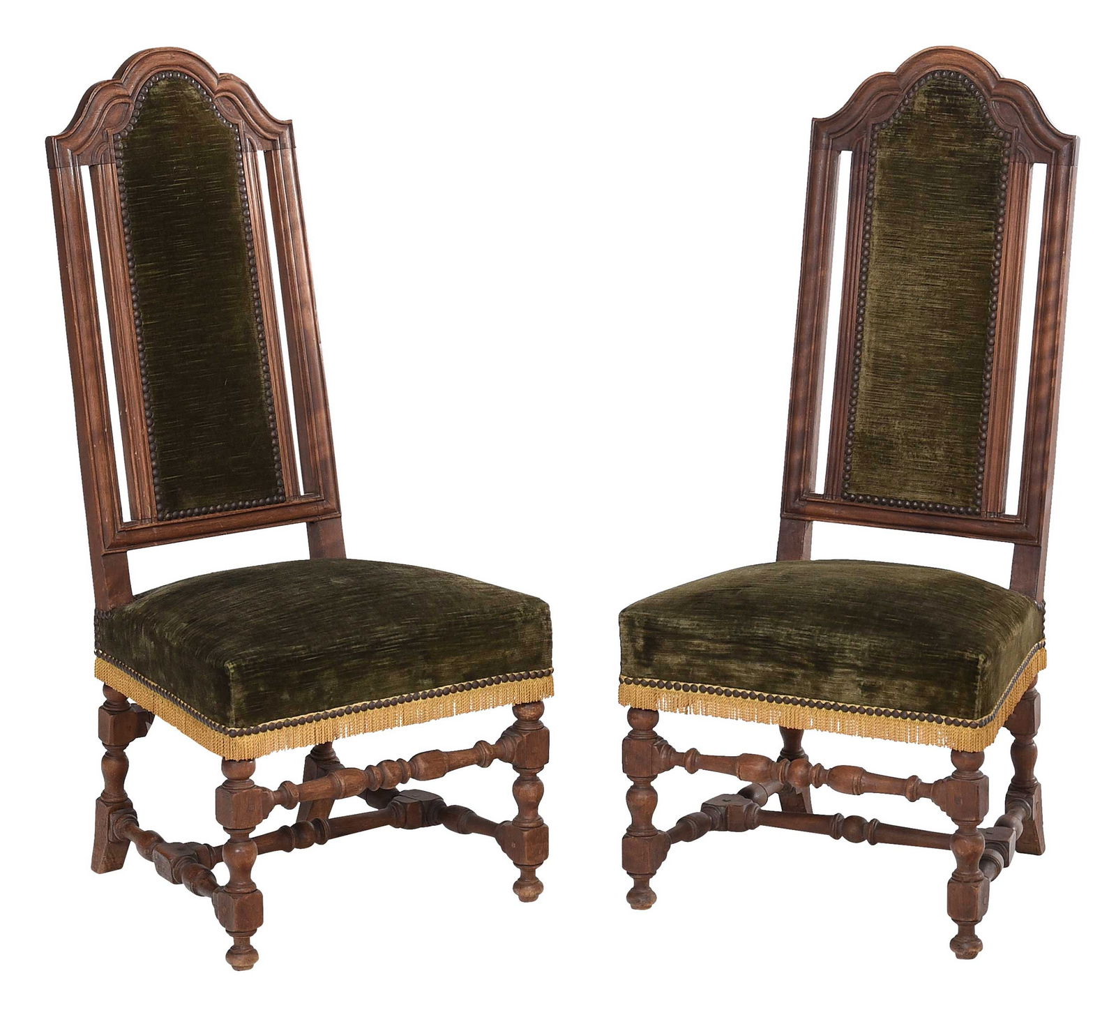 Pair of Jacobean Style Walnut Slipper Chairs: British, 19th/20th century, high backs, tacked green velvet upholstery with gold fringe at seat rail, 42-1/4 x 19-1/4 x 21-1/2 in., seat height 16-1/2 in. 