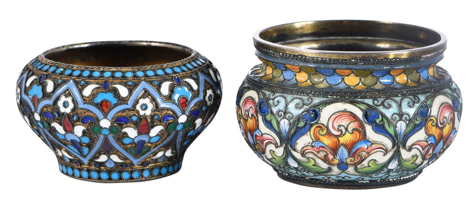 Two Russian Gilt Silver and Enamel Open Salts: Moscow, late 19th century, colorful floral and scroll enamel decoration, maker possibly Yakov Borisov, .875 fine, 1-1/4 x 2-1/4 in.; scroll and geometric enamel decoration, gilt interior, marker