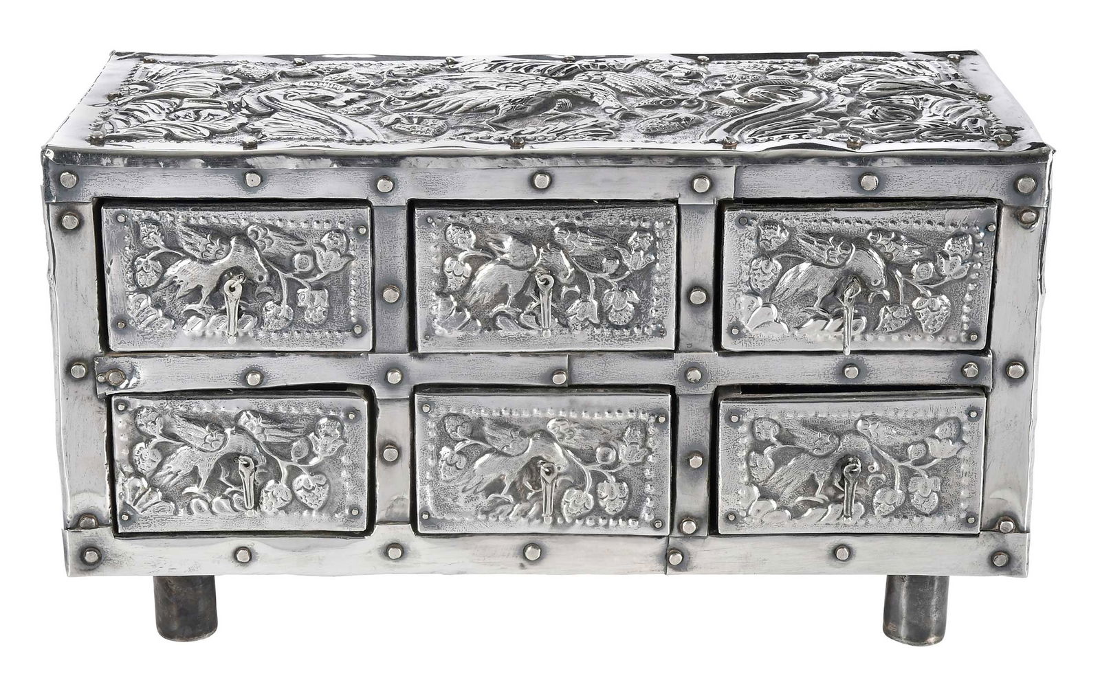 Spanish Silver Mounted Six Drawer Miniature Chest of Drawers: probably Spanish, 20th century, six drawer, hard wood base, silver mounts with bird and berry decoration, silver test .900 fine, 10 x 17-1/2 x 8 in.Provenance: Property from a Private Collection,