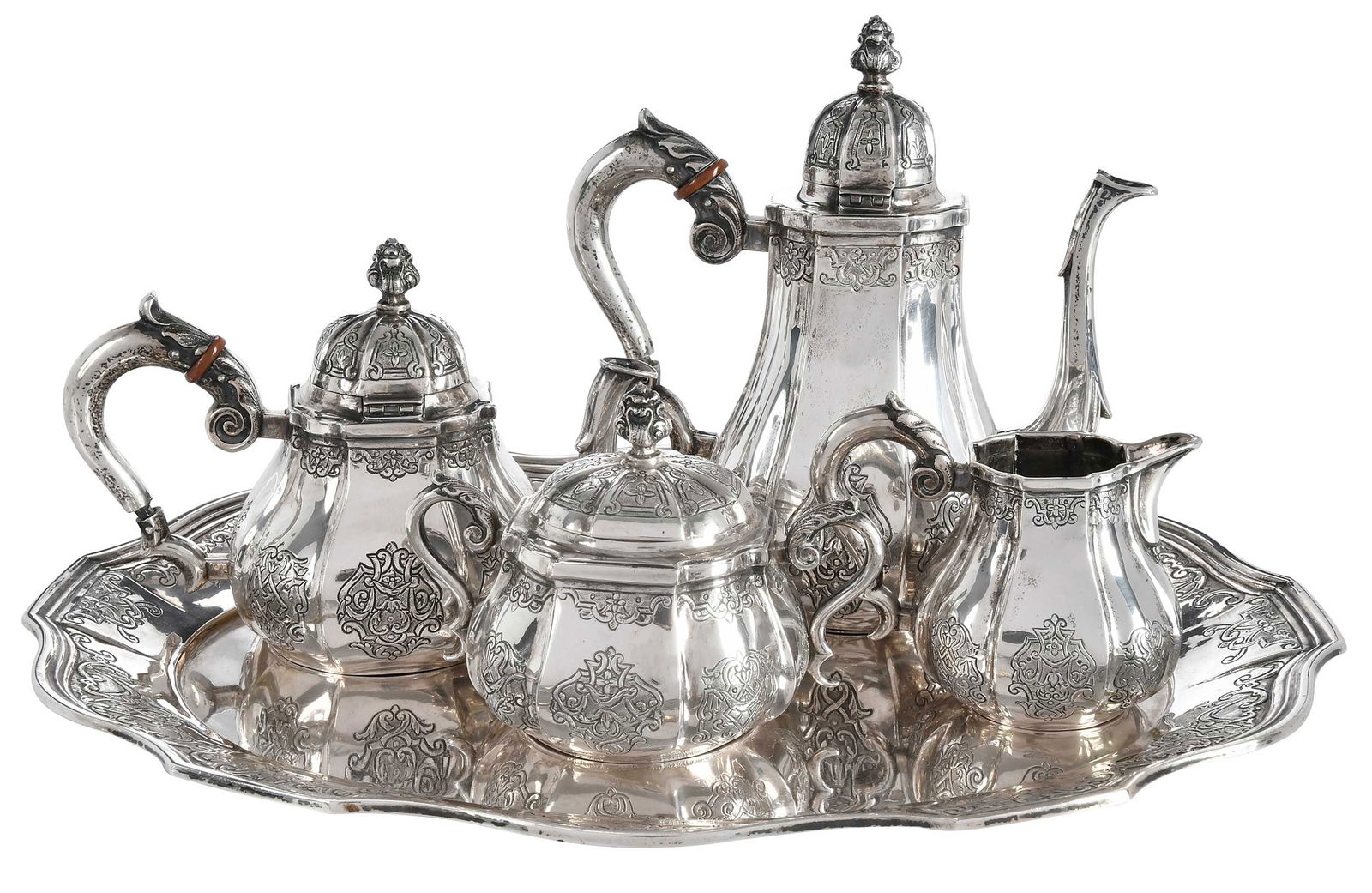 Four Piece German Silver Individual Tea Service and Tray: Hanau, 20th century, paneled forms, swag and scroll decoration, composite spacers, marks for Schleissner, .800 fine, 56.97 oz. T., including 7 in. coffee with matching teapot, covered sugar, creamer,