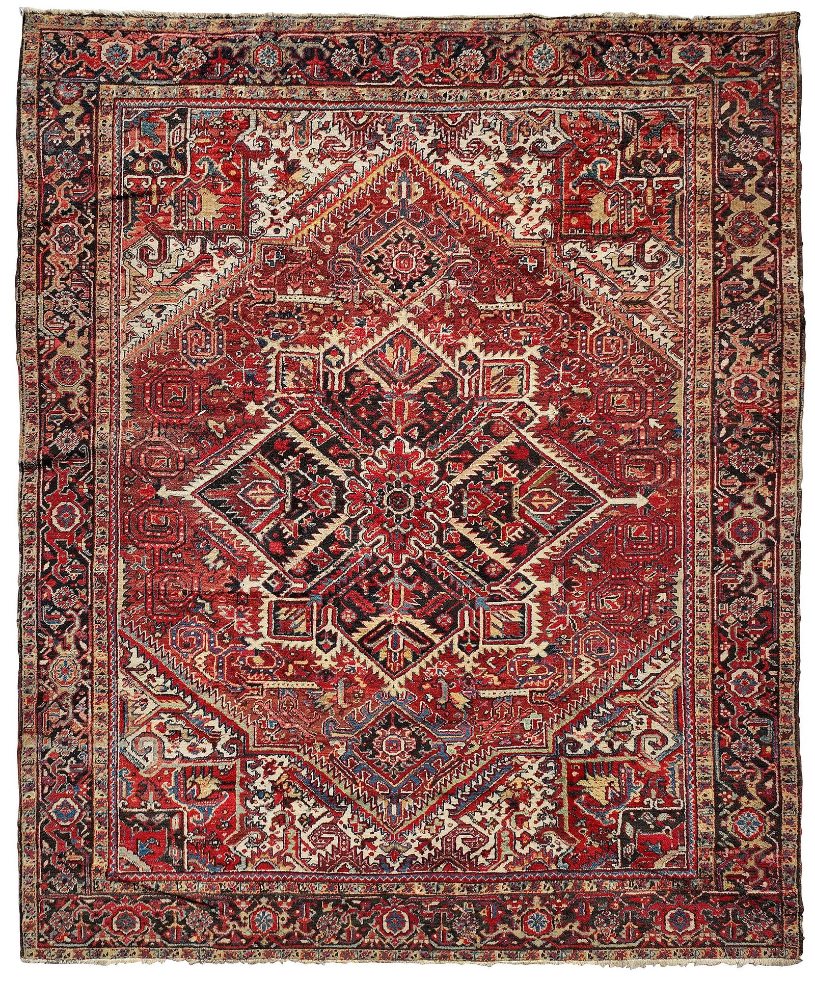 Heriz Carpet: 20th century, central diamond shaped medallion, red field, blue border, 10 ft. 5 in. x 9 ft. Provenance: Private Collection, Greenville, South Carolina