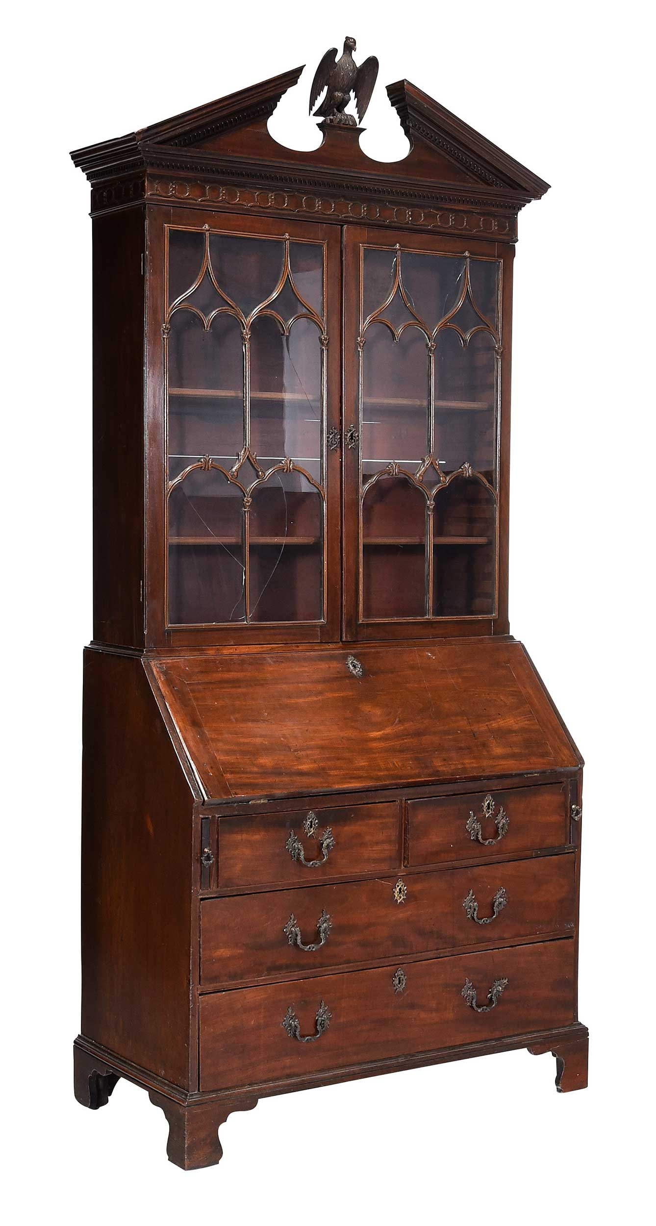George III Mahogany Secretary: British, late 18th century, oak and pine secondary woods, two sections, broken pediment cornice centering an eagle, slant front interior with pigeon holes, valance and small drawers, 98 x 45 x 22-1/2