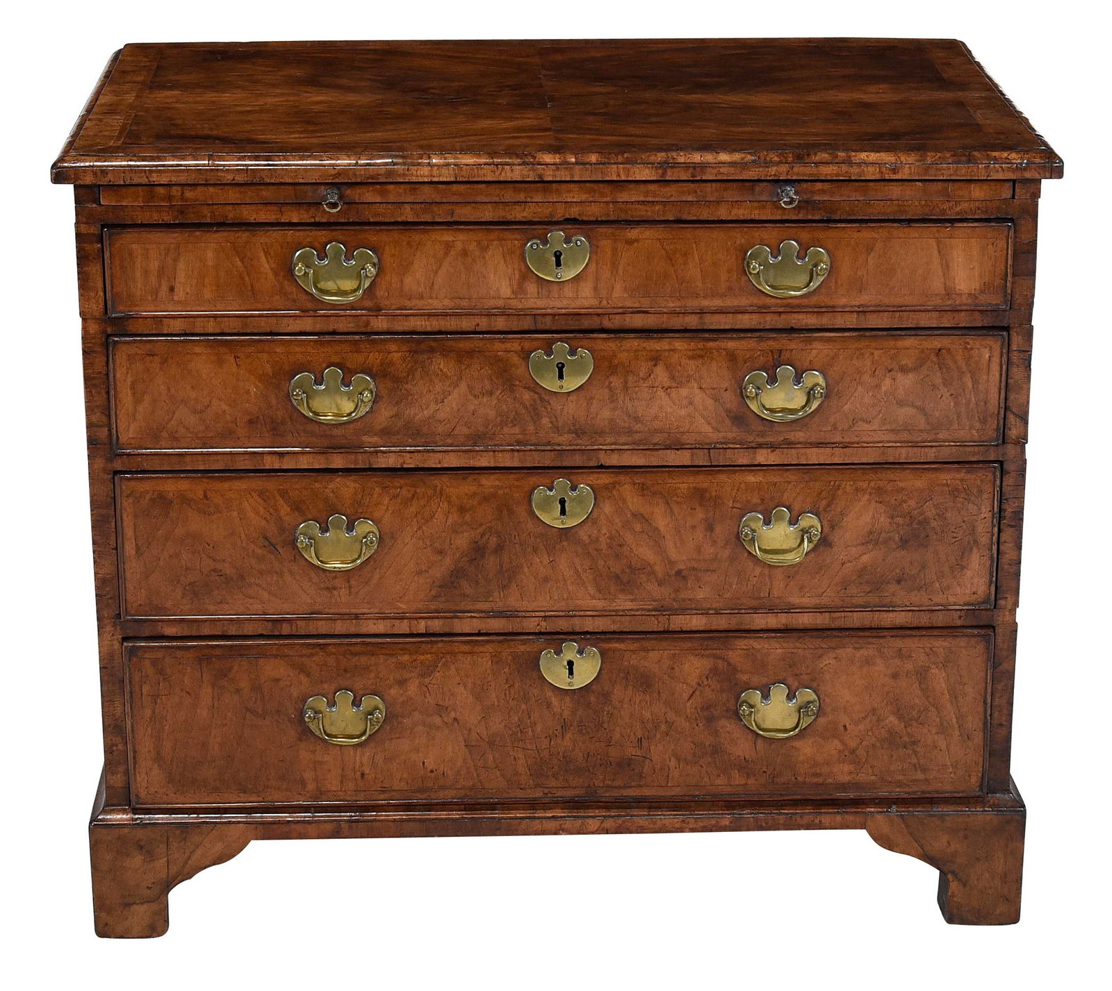 Early Georgian Figured and Bookmatched Walnut Bachelor's Chest: British, 18th century, crossbanded veneered top, dressing slide over four beaded edge drawers, 29 x 34 x 20-1/4 in.Provenance: Private Eastern North Carolina Collection