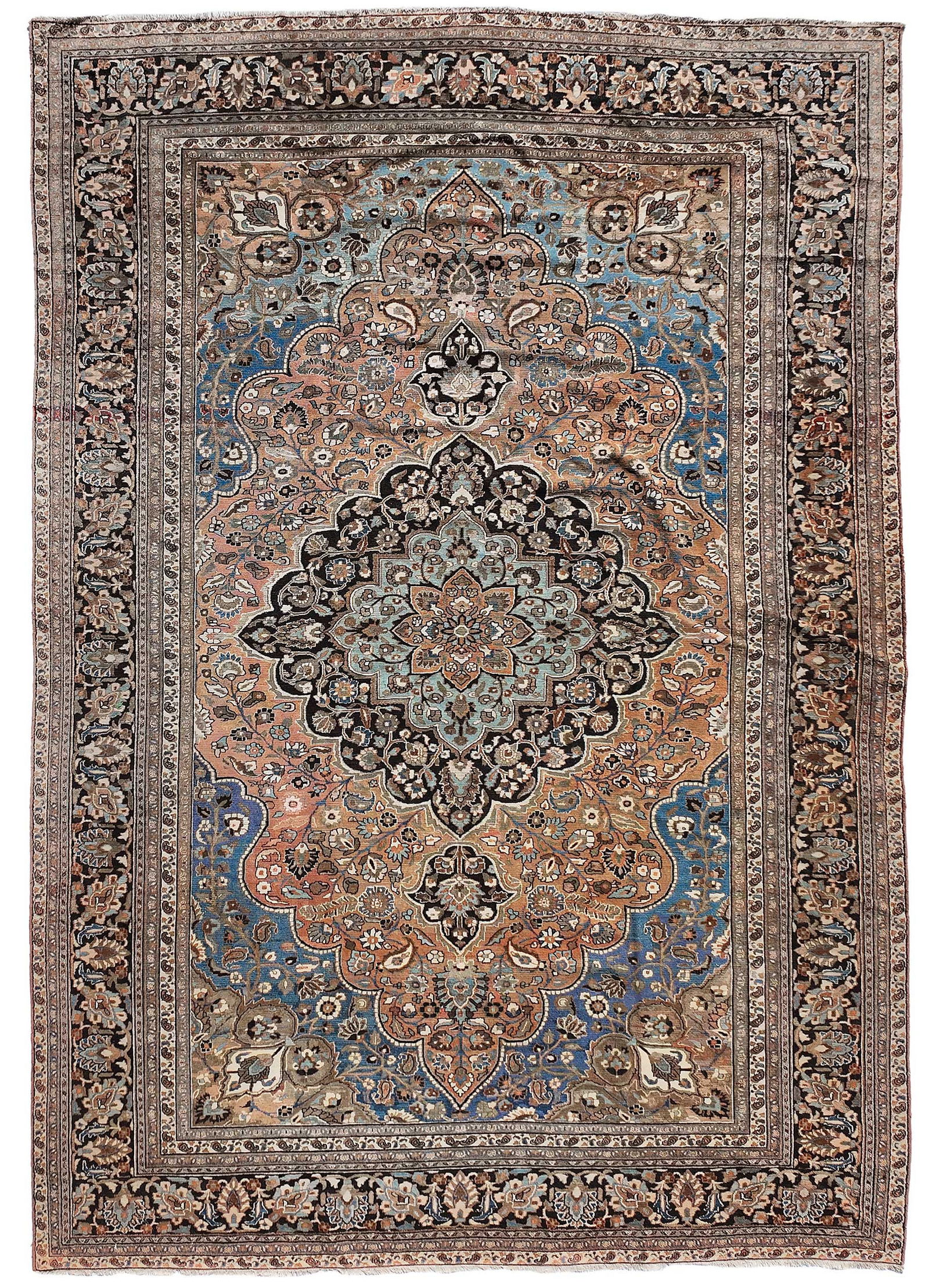 Tabriz Carpet: mid 20th century, central medallion on red ground, dark blue main border, 18 ft. x 12 ft. 2 in. Provenance: Private Collection, Greenville, South Carolina