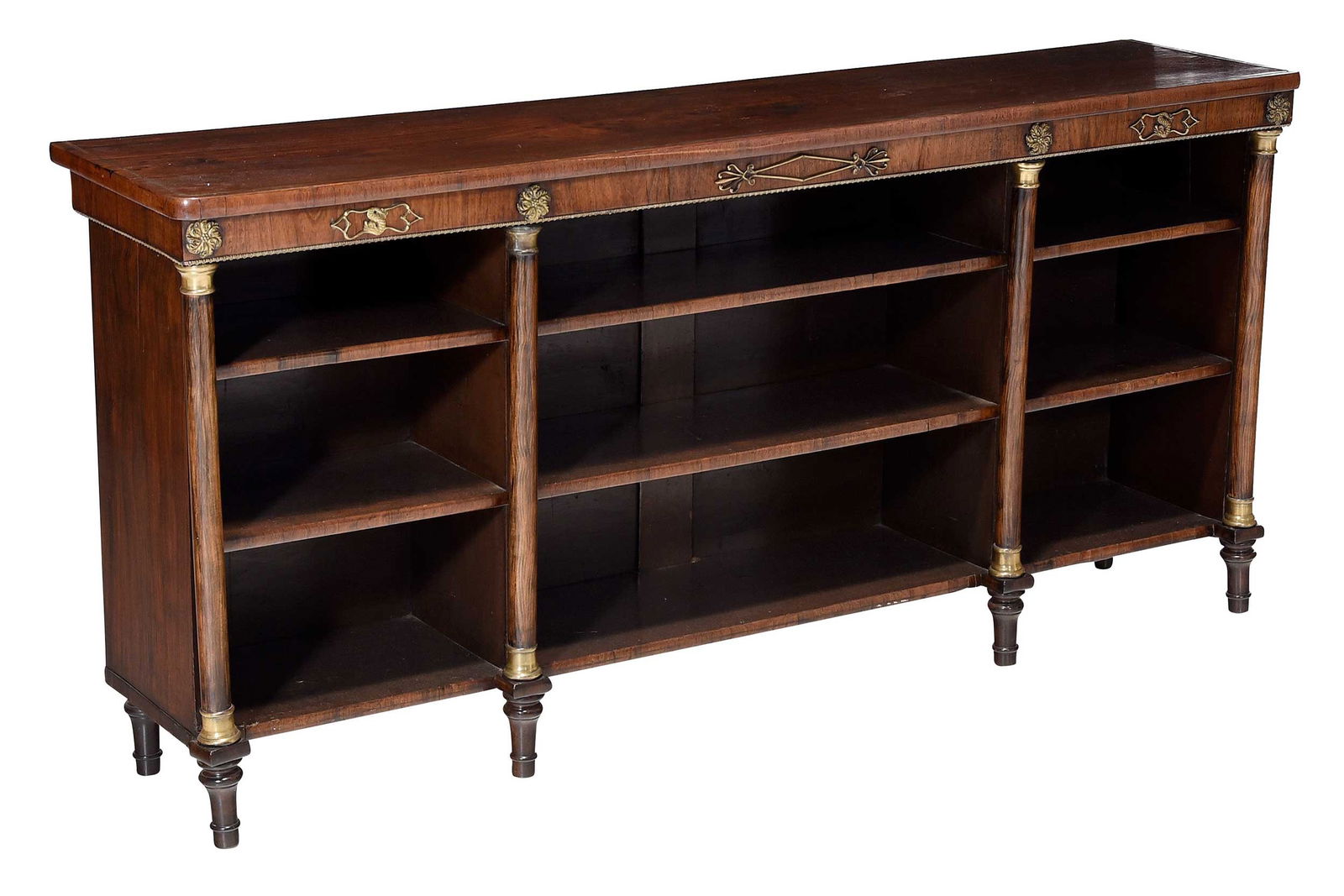Regency Style Brass Inlaid Rosewood Bookshelf: late 19th century, rosewood veneer, top with grain painted columns and sides, pine shelves, 33-1/2 x 71 x 15-1/2 in.Provenance: Property from a Private Collection, Vero Beach, Florida