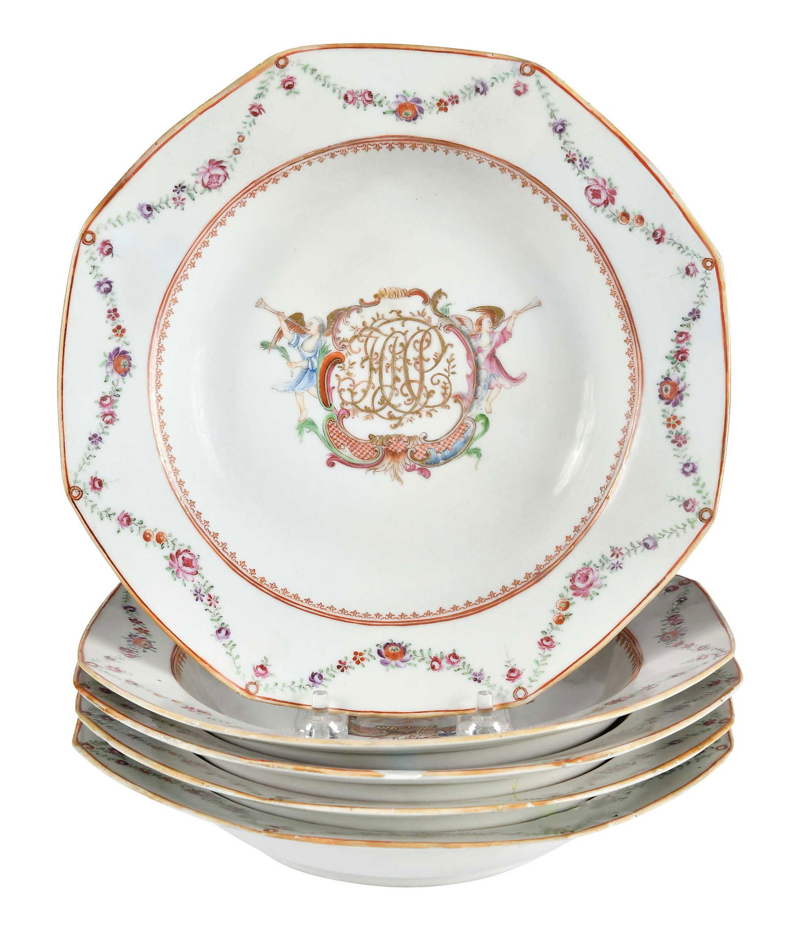 Five Chinese Export Monogrammed Soup Plates: 18th century, flower festoons and gilt spearhead centering cartouche flanked by trumpeting angels with monogram "JJCC", 1-3/4 x 9-1/8 x 9-1/8 in. Provenance: Polly Latham Asian Art (label); Estate of