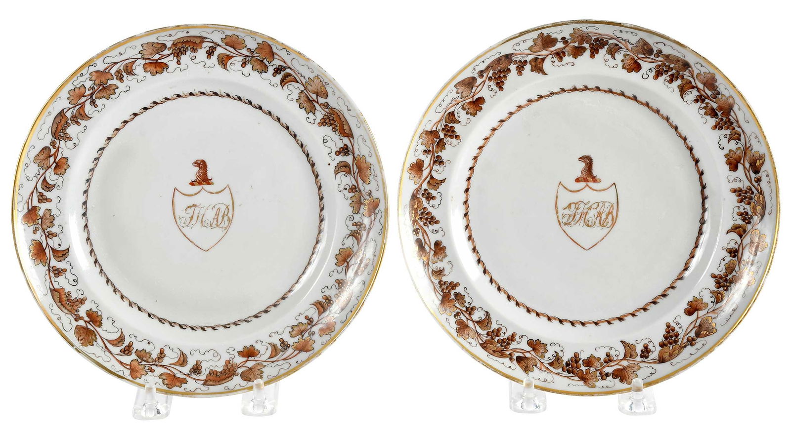 Pair of Chinese Export Armorial Monogrammed Plates: circa 1795, sepia and gilt vines and bands centering a falcon's head crest and shield with initials "T.H.A.B.", 3/4 x 7-3/4 x 7-3/4 in.Provenance: Estate of Lamar John Ryan Cecil, Lynchburg,