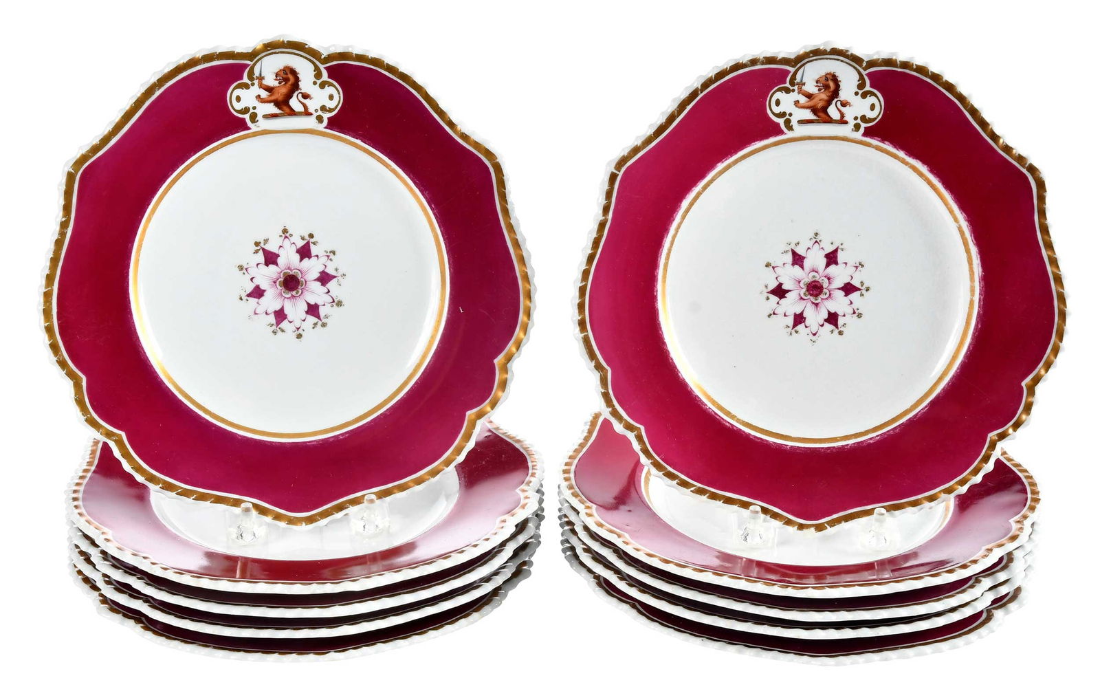 Set of 10 Chamberlain Worcester Armorial Porcelain Plates: early 19th century, each stamped "Chamberlains" to base, wide ruby enamel bands centering floral decoration, rampant lion with sword in the border, 1-1/8 x 8-7/8 x 9 in.Provenance: Estate of Lamar