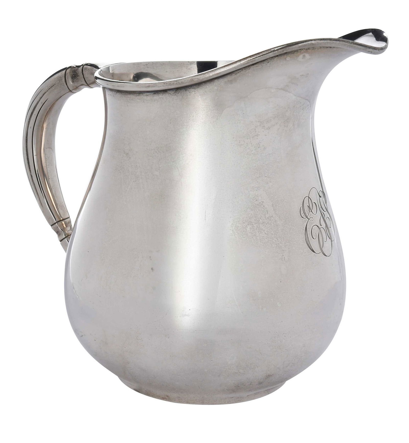 Tuttle Sterling Water Pitcher: American, 20th century, round modern style, monogram, marks for Tuttle, 24.17 oz. T., 7-3/4 x 8-3/4 x 6 in.Provenance: Estate of Linda Sargent Thompson, Historic Sesame Lodge, North Augusta, South