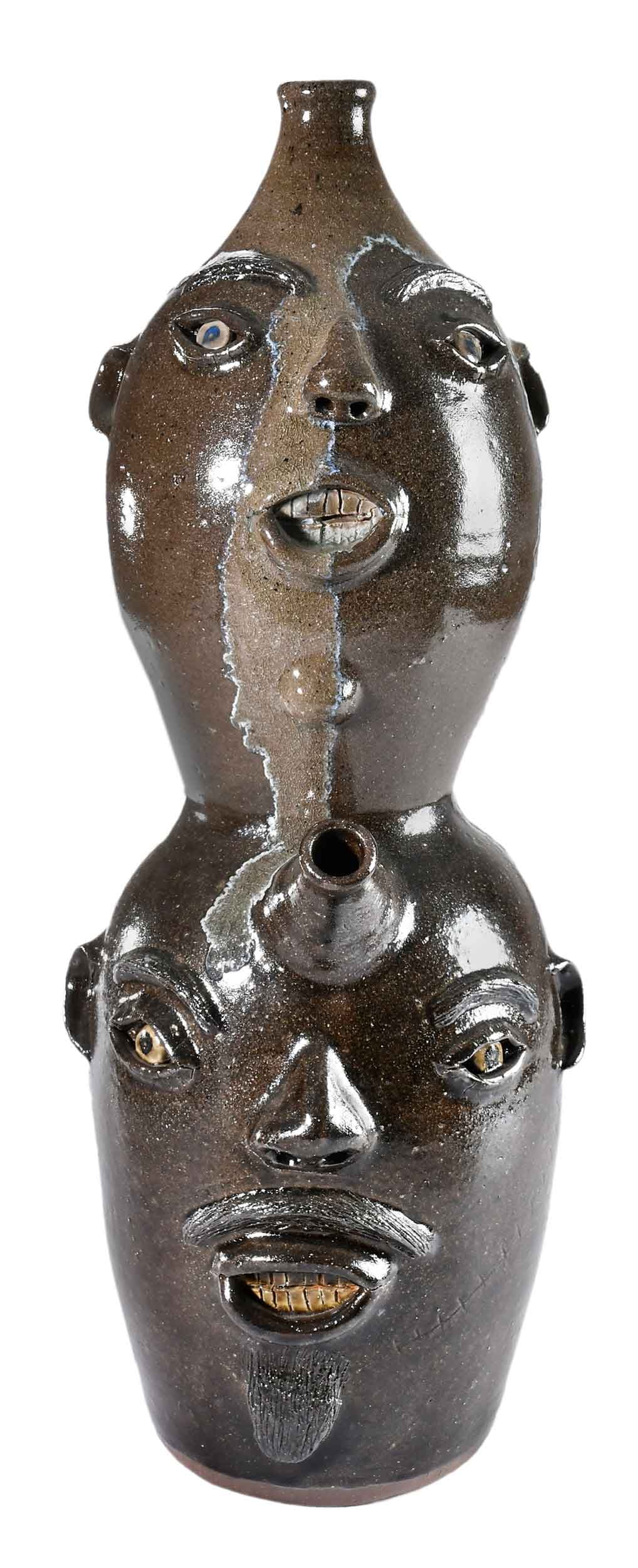 Monumental South Carolina Billy Henson Double Face Monkey Jug: (Spartanburg County, SC, 1941-1961) double gourd form, tan alkaline glaze to upper jug, olive green alkaline glaze to lower jug, four large melt runs with rutile highlights from upper spout down