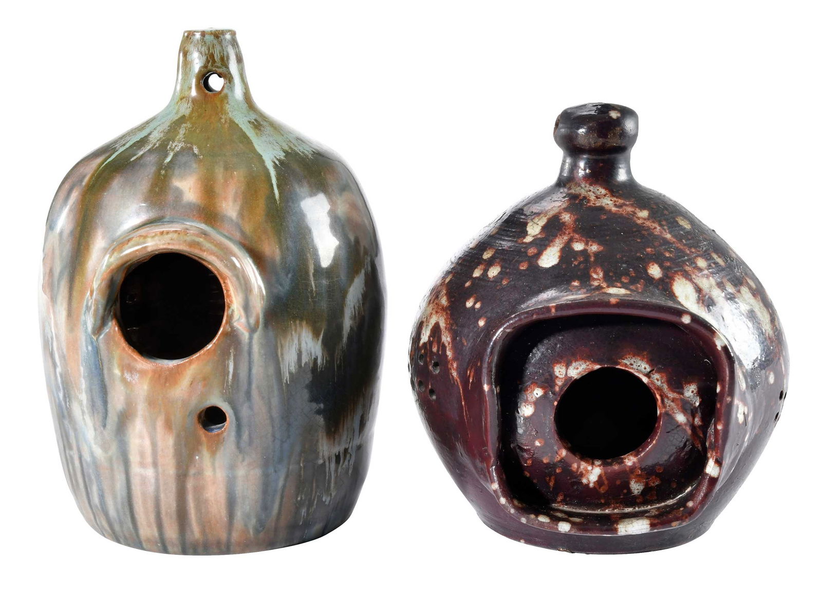 Two Decorated North Carolina Pottery Bird Houses: birdhouse with streaky multicolor blue and green glaze, inscribed "Seagrove" on base, possibly Dorothy Cole Auman, circa 1970s, Seagrove Pottery, 8-1/2 in.; birdhouse with rare dark brown Abany slip g