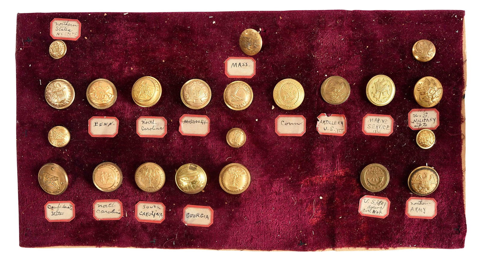 Military Uniform Buttons, Civil War: 22 uniform buttons with Civil War relevance, includes examples identified as: New York, Pennsylvania, North Carolina, Missouri, Massachusetts, Connecticut, UCV (United Confederate Veterans), South Car