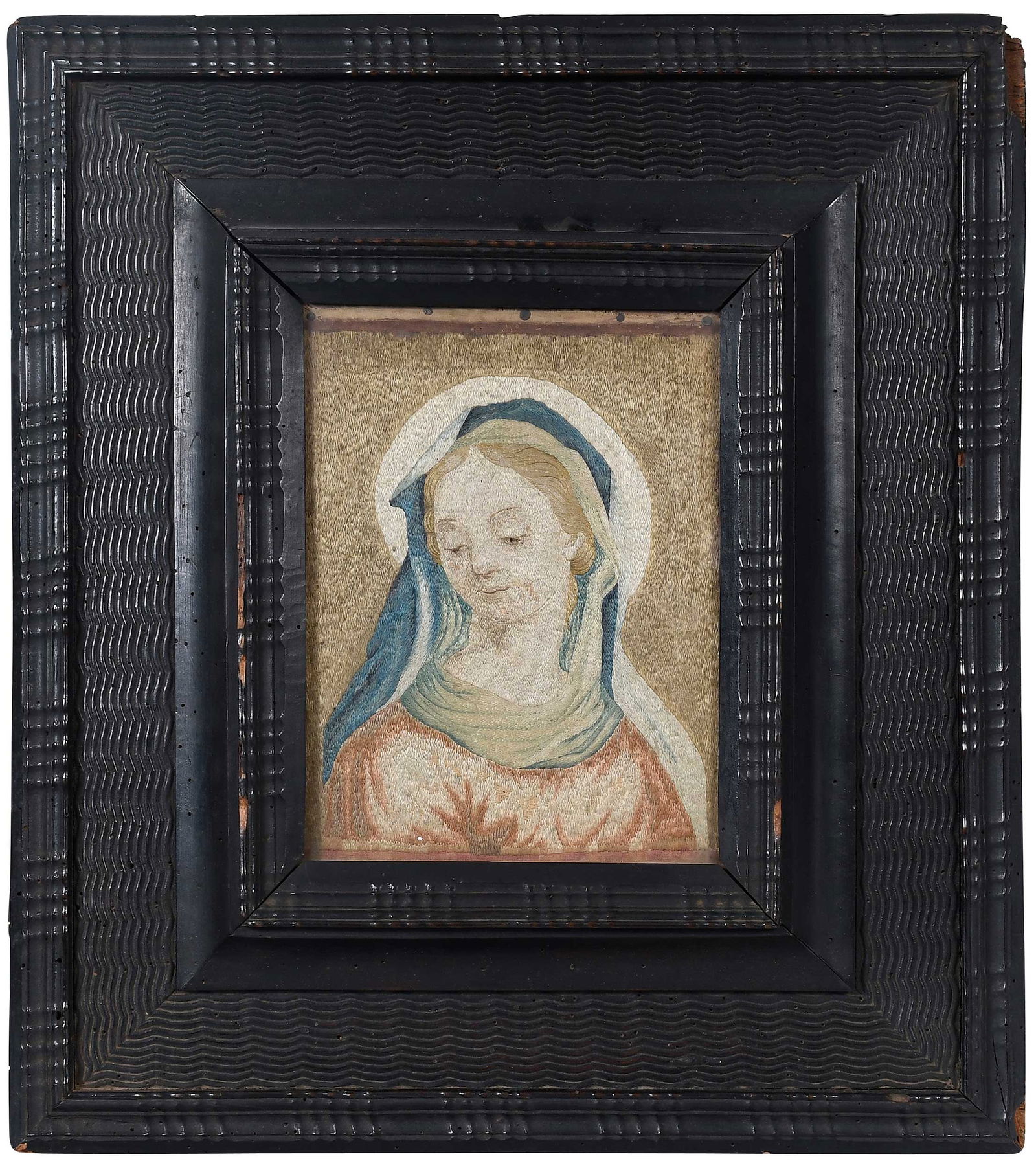 Framed Italian Needlework on Linen of Madonna: late 17th/early 18th century, silk on linen, sight 8-1/2 x 6-1/4 in.; in carved and black painted wood frame, 17-7/8 x 15-7/8 x 2-1/2 in. Provenance: 1971, bequest of Julian Clarence Levi of New York,
