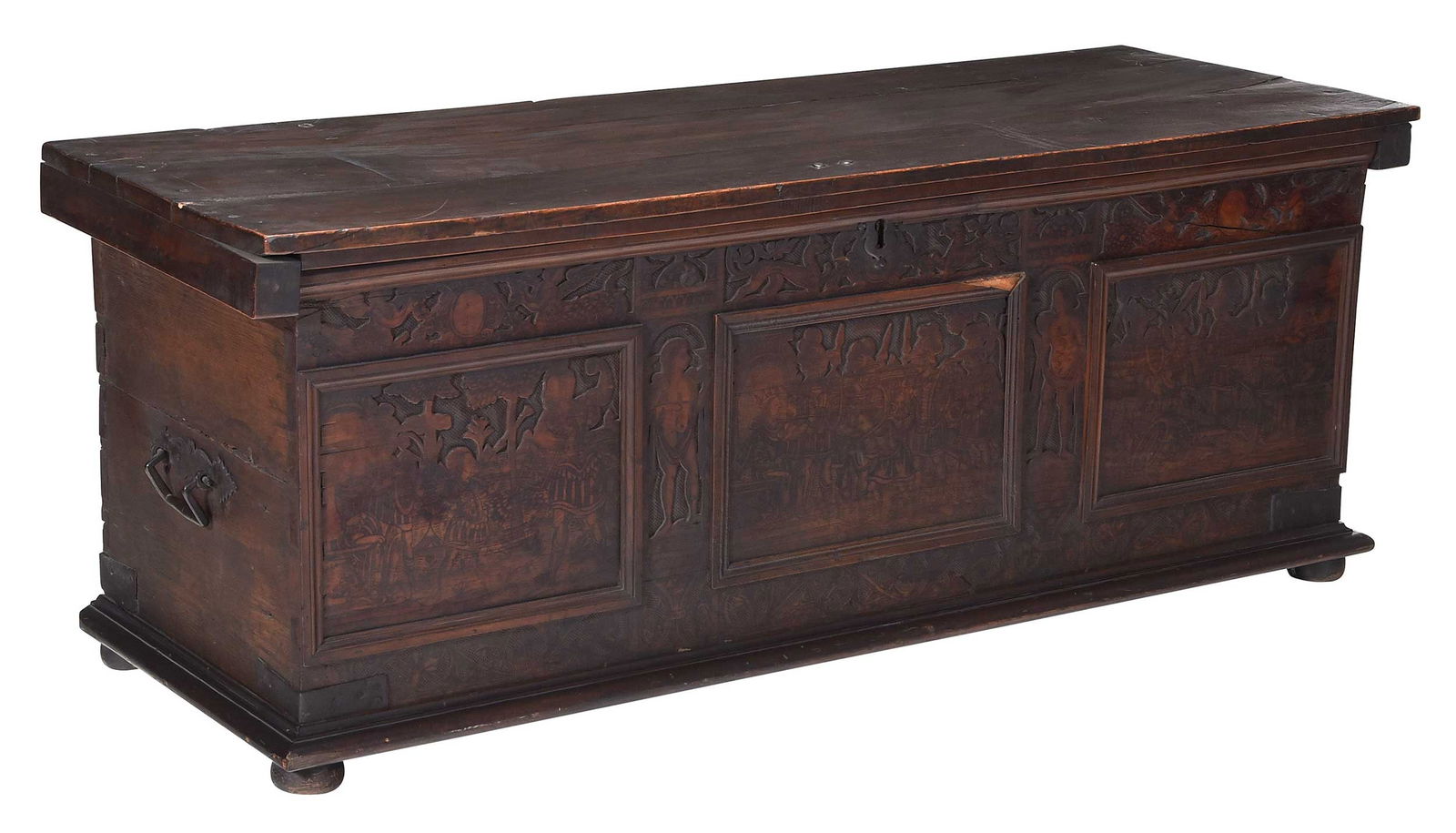 Continental Relief Carved Walnut Cassone: probably Italian, 19th century and earlier, three board lid with iron strap hinges, pyrography to lid underside, punchwork and penwork figural decoration to front and side with soldier motif, iron