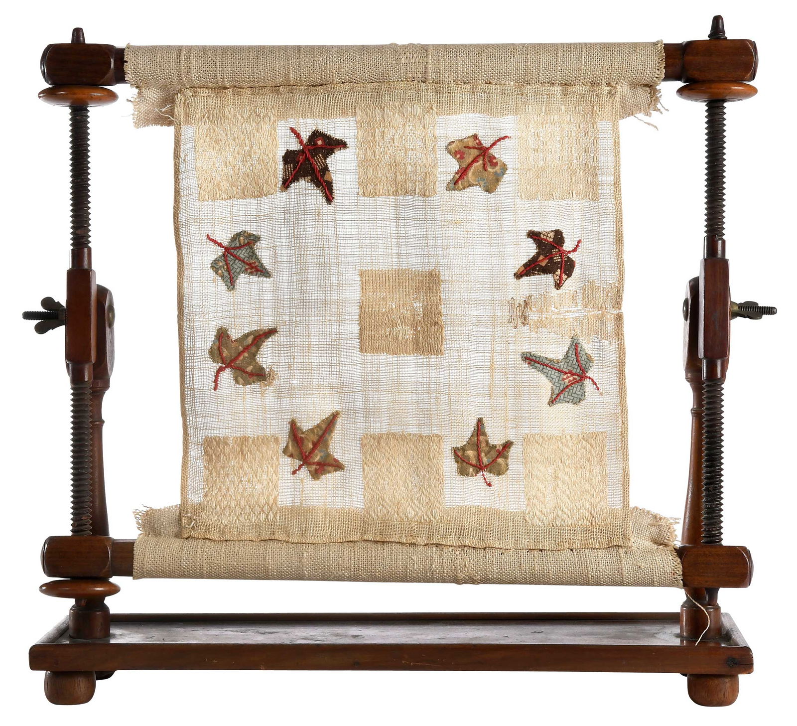 English Embroidery Mahogany Table Frame with Sampler: mid-19th century, adjustable spindle and bar frame, silk on linen darning stitch sampler with fabric applique leaves, 14-1/2 x 15-3/4 x 4-1/2 in. Provenance: 1944, purchased from Mrs. Lawrence J. Ullm