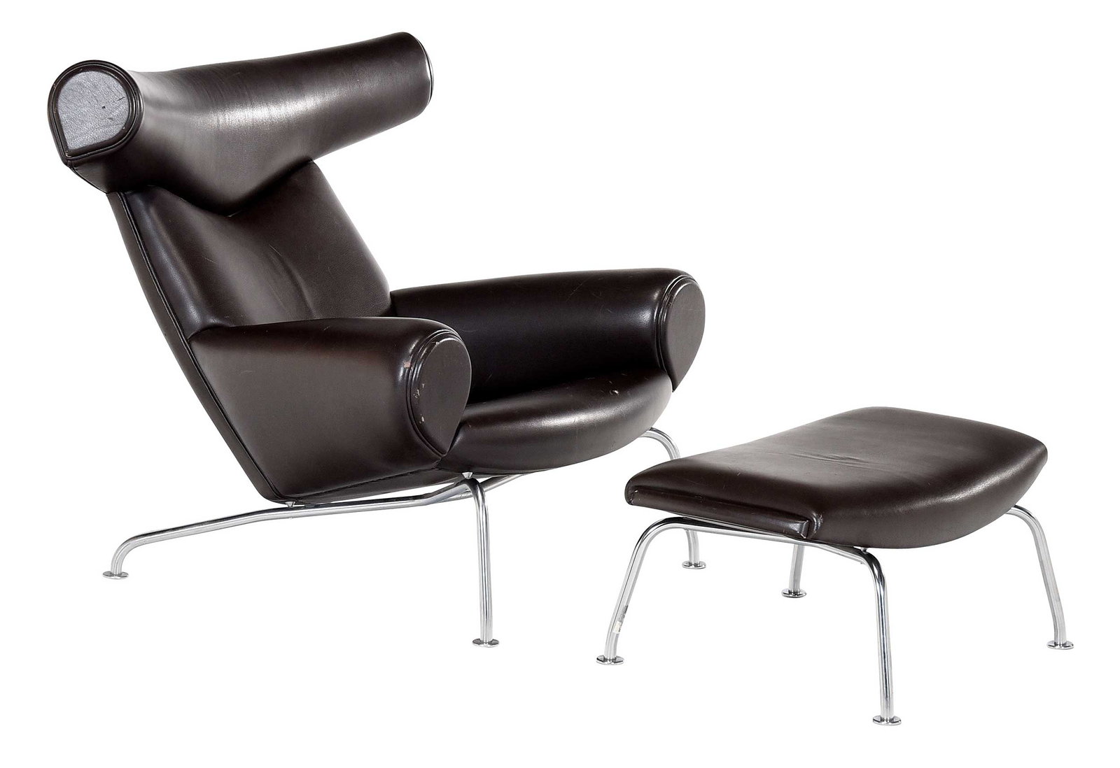 Hans Wegner Designed Mid Century Modern Ox Lounge Chair with Ottoman: 20th century, replica, dark brown leather upholstery, polished steel frame, chair 34-3/4 x 37-1/2 x 38 in., seat height 14 in., ottoman 13-1/2 x 30 x 18-1/4 in.Provenance: Private Chicago Collection