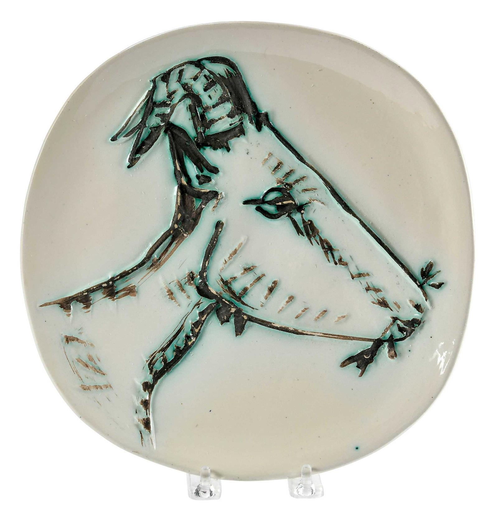 Pablo Picasso Ceramic Plate: (Spanish, 1881-1973)Tete de chevre de profil (A.R.109), 1950, from an edition of 60, stamped verso "Madoura/Plein/Feu" and "Empreinte/Originale De/Picasso", glazed white earthenware with black oxide