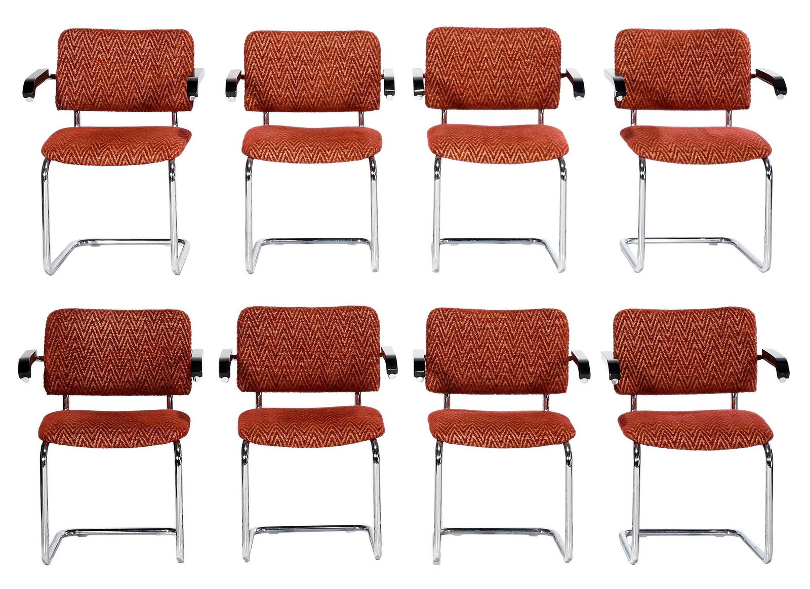 Set of Eight Modern Cesca Type Armchairs, Made in Italy: 20th or 21st century, tubular chrome plated steel frame, ebonized wood armrests, "MADE IN ITALY" labels to undersides, 32-1/2 x 23-3/4 x 22 in., seat heights 17-3/4 in. Provenance: Private Collection,