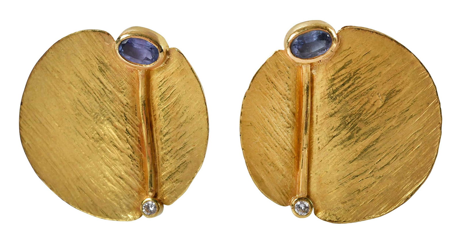 18kt. Barbara Heinrich Textured Disc Earrings with Tanzanite and Diamonds: two oval faceted tanzanite, approx. 0.50ctw., two round faceted diamonds, approx. 0.20ctw., tests 18kt. yellow gold, approx. 7/8 in diameter, 6.5 g Provenance: Private Collection Note: Accompanied by