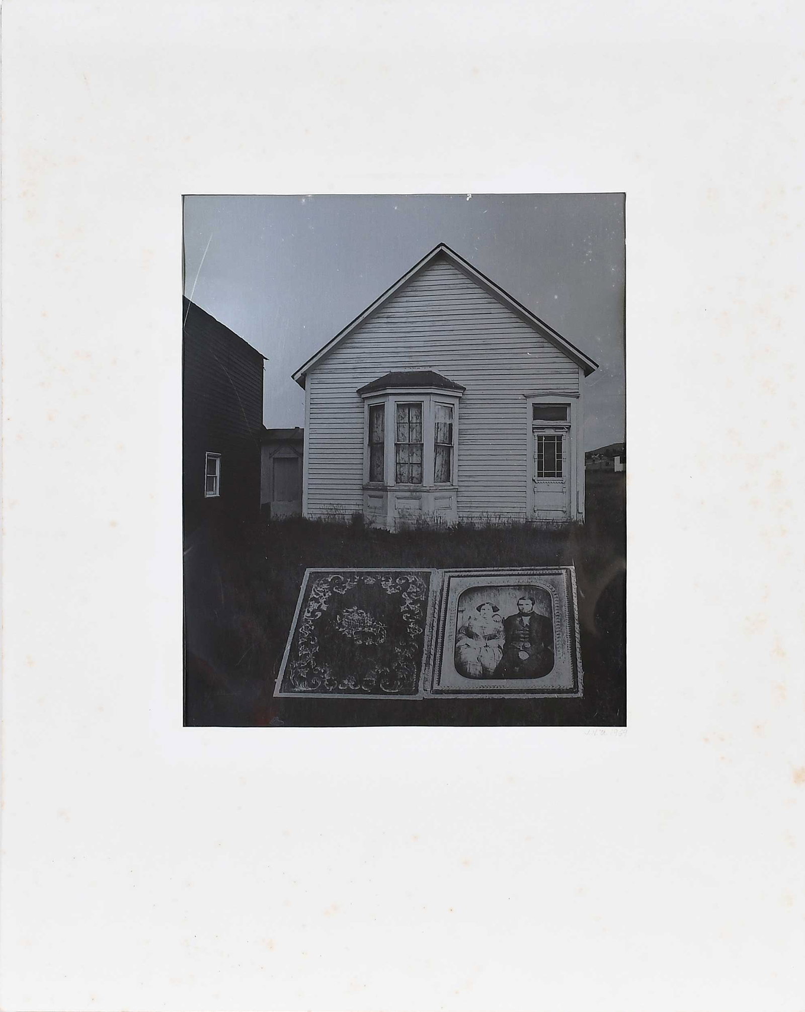Jerry Uelsmann: (American, 1932-2022)Untitled (Homage to the daguerreotype), 1969, silver print on aluminum, 11-7/8 x 9-1/2 in., matted not framed, initialed and dated "J.N.U. 1969" on mat, mat 20-1/8 x 16