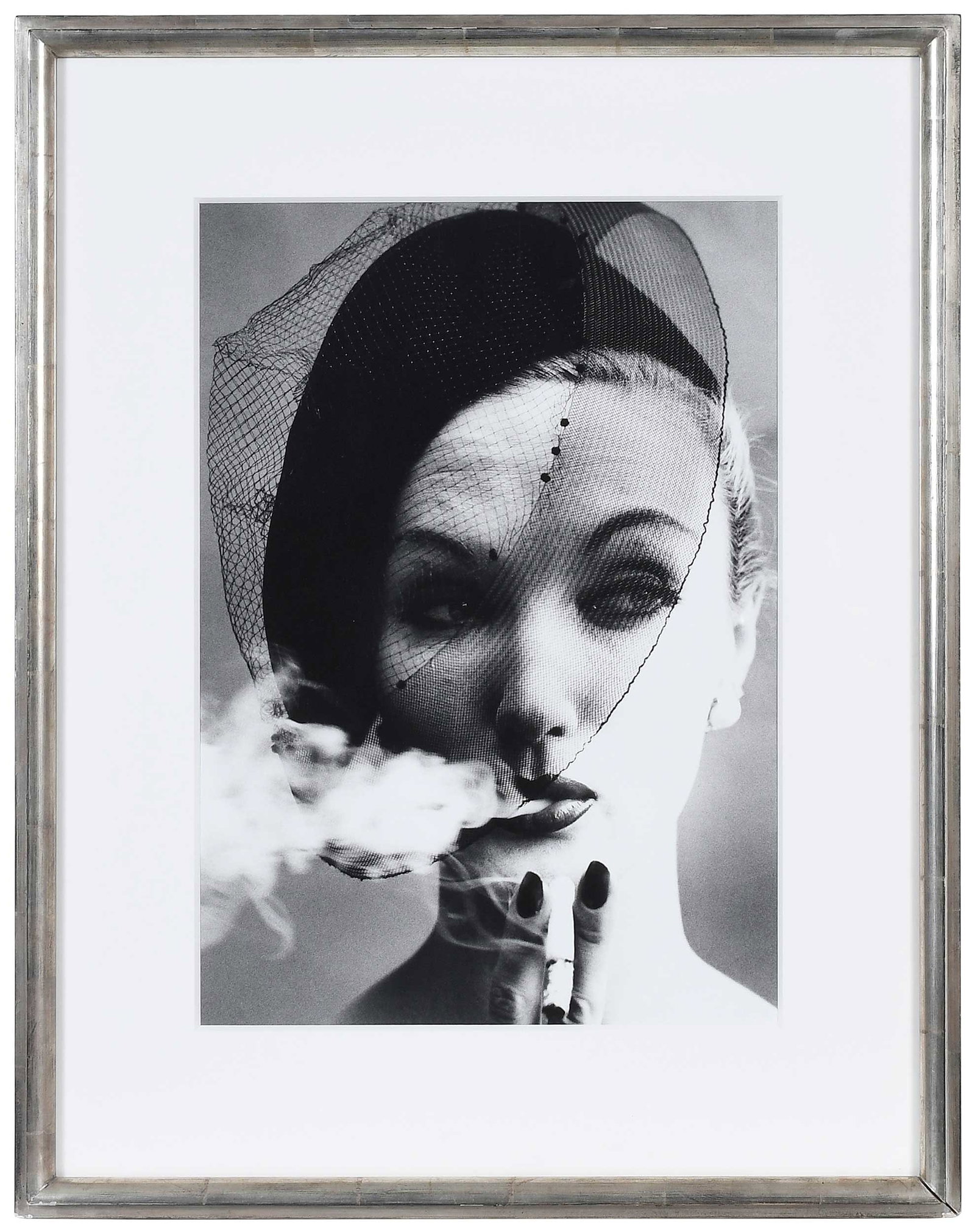 William Klein: (American, 1926-2022)Smoke and Veil, Paris (vogue), image 1958, printed later, possibly 1972, gelatin silver print, image 17-3/4 x 12-3/4 in.; fine silver finished wood frame, 26 x 20 in.Provenance:
