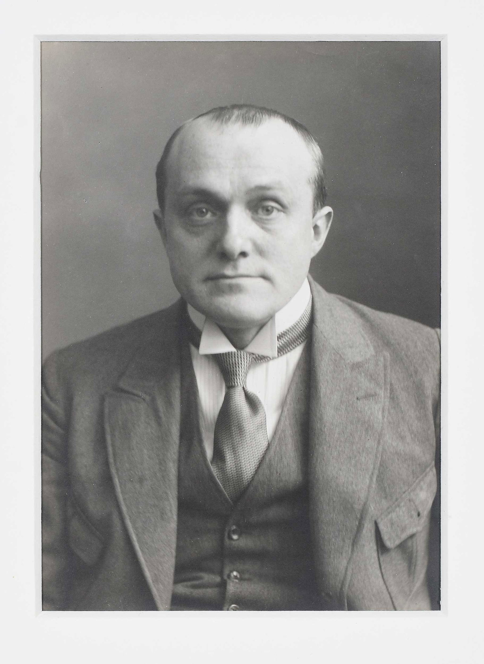Hans Moller: (Germany/America, 1905-2000) Max Beckmann, 1922, annotated by Reinhard Piper in black ink verso, "Max Beckmann Dec. 1922 Munchen", dated in pencil verso, "Dez 1922", gelatin silver print, 5-5/8 x 4-1/