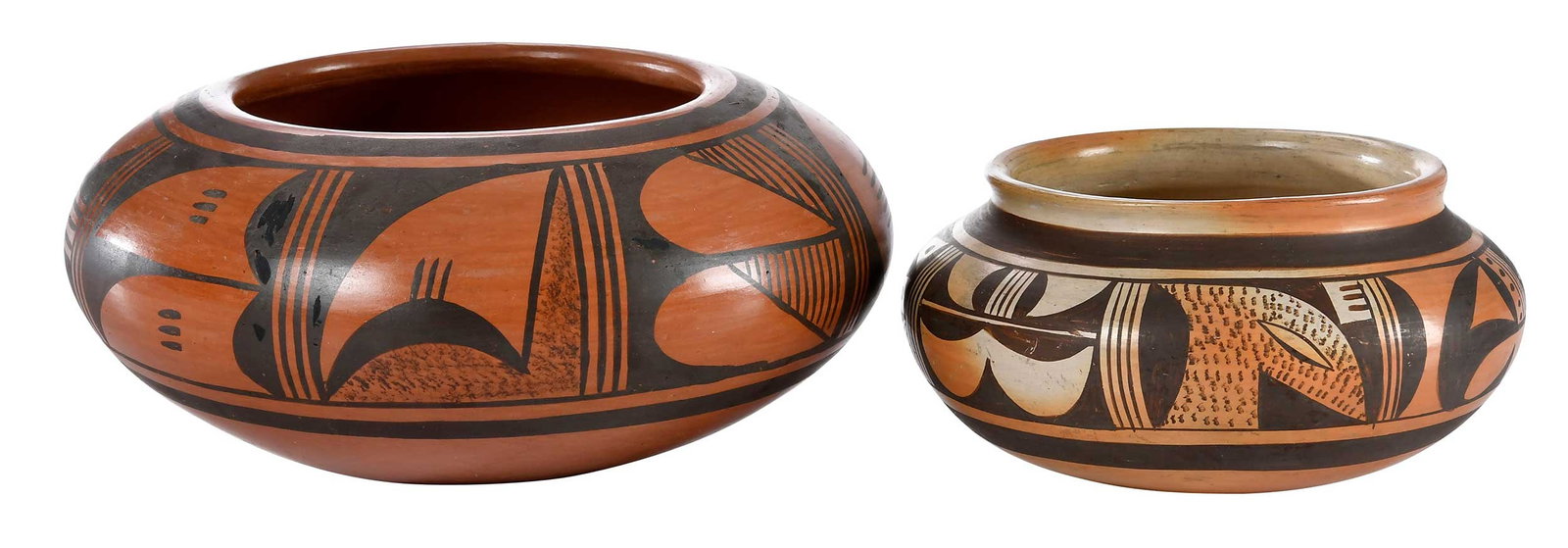 Two Hopi Pots: 20th century, the first signed "Fannie Nampeyo " (1900-1987) on base, 3 x 5-3/4 in.; the second signed "Verna Nahee" (born 1940) on base, bears old tape label, 3-3/4 x 7-3/4 in.;Provenance: Private