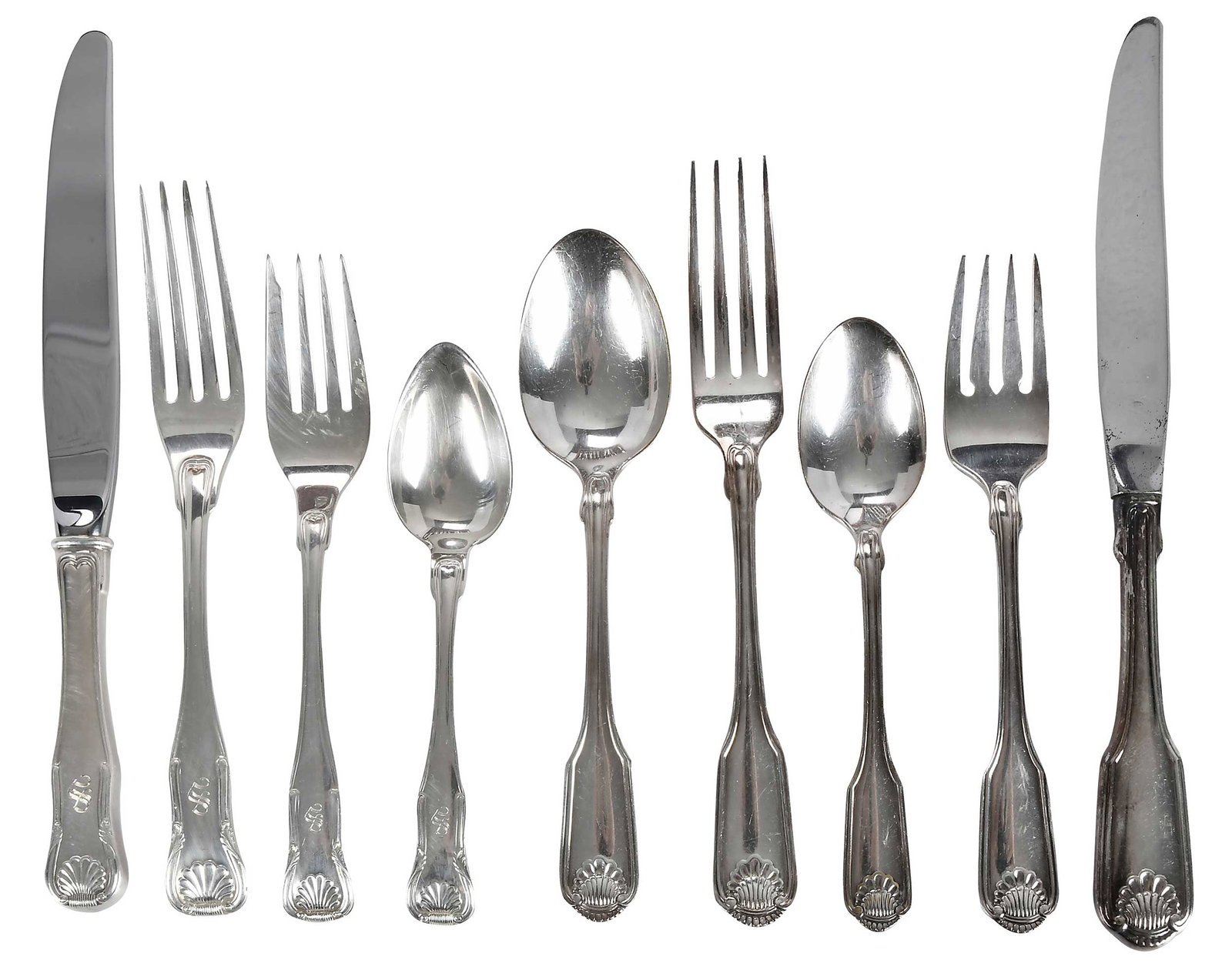 Kirk King Sterling Flatware, 35 Pieces, Similar Stainless Flatware: American, 20th century, including eight hollow handle knives; eight forks; eight salad forks; eight teaspoons; serving fork; gravy ladle; bon bon, all with monograms, marks for Kirk & Son, 41.02 oz. T