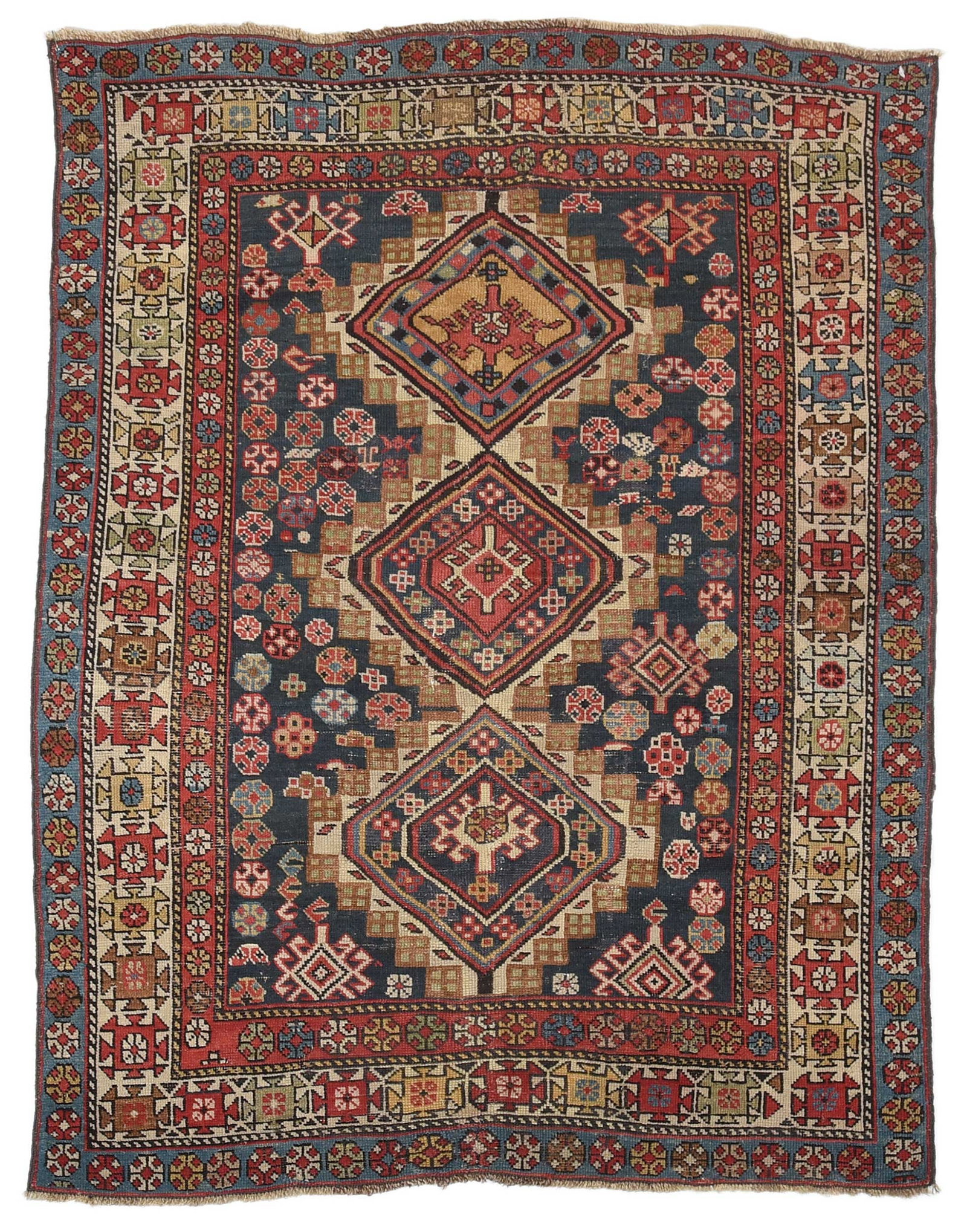Kazak Rug: mid 20th century, three medallions on blue ground, white main border, 5 ft. x 3 ft. 9 in.Provenance: Private Collection, Asheville, North Carolina
