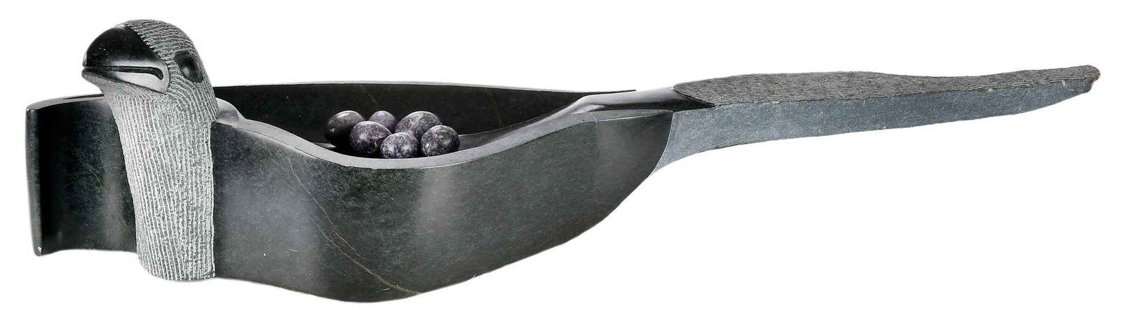 Shona Carved Stone Sculptural Bird Bowl, Eggs: (Zimbabwe, 20th/21st century)Water bird in the form of a bowl, accompanied by six stone eggs, not apparently signed, carved serpentine, overall 9 x 35-3/4 x 12 in.Provenance: Private Collection,
