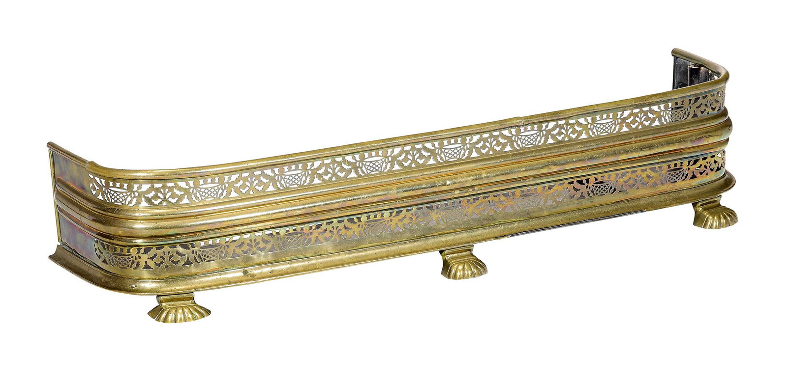 Classical Pierced Brass Shell Foot D Shaped Fireplace Fender: British or American, 19th century, brass and black painted iron, pierced with basket motif and leaves, applied base molding, three shell form feet, 8-1/4 x 43-1/4 x 11-3/4 in. Provenance: Purchased by