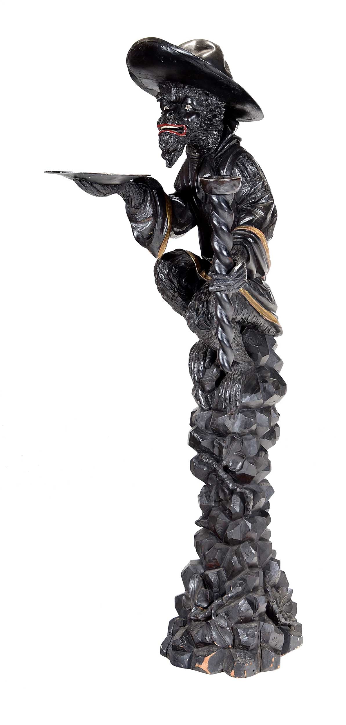 Large Continental Carved and Ebonized Wood Monkey Serving Figure: probably Italian, 19th century, finely detailed in form of monkey proffering tray and torchiere, gilt and red painted elements, approximately 68 x 18 x 31 in. Provenance: Collection of Steve Stewart, 