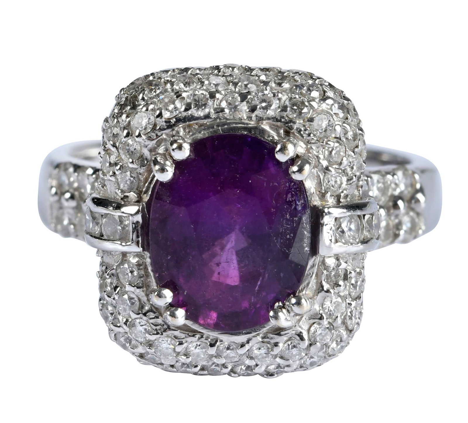 18kt. Rare Purple Tourmaline and Diamond Ring: oval faceted purple tourmaline, 2.35ct., 72 round faceted diamonds, approx. 1.15ctw., SI, G-I, marked "18K", white gold, 8 ring sz., four double prongs, 7.5 g Provenance: Private Collection, Virginia 