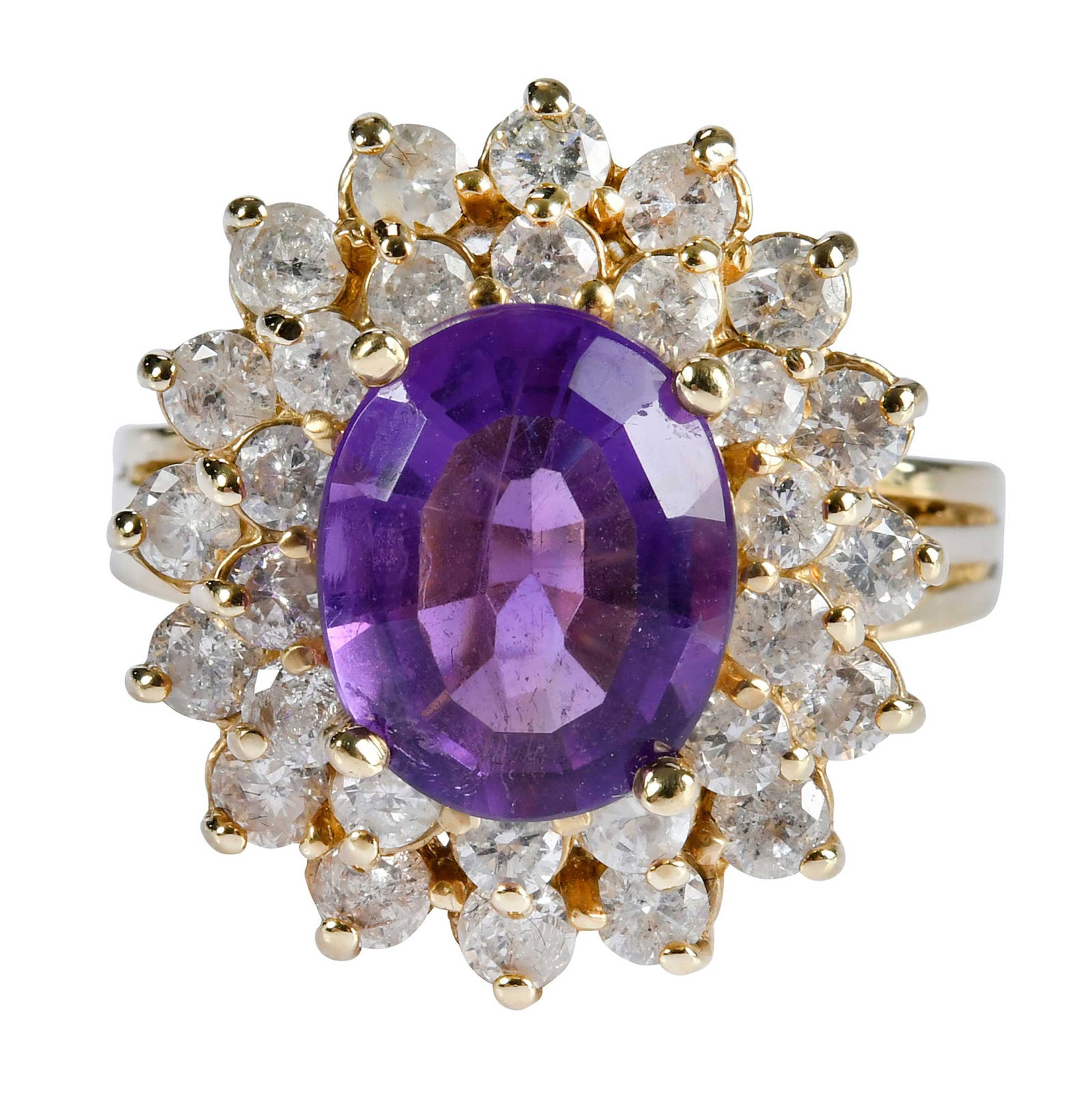 14kt. Amethyst and Double Diamond Halo Ring: oval modified cut purple amethyst, 30 round faceted diamonds, approx. 1.10ctw., marked "14K", yellow gold, 8-1/4 ring sz., 9.8 g Provenance: Private Collection, Virginia Beach Note: Brunk Auctions mak