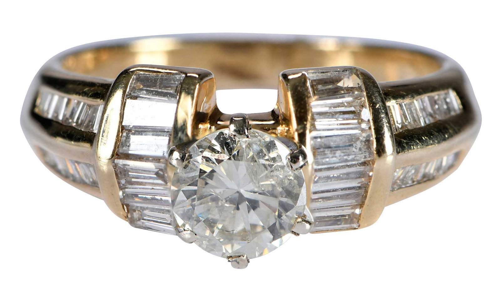 14kt. Modern Style Diamond Engagement Ring: center round brilliant cut diamond, approx. 0.80ct., I, K-M, accented with straight and tapered baguette cut diamonds, approx. 0.90ctw., SI, I-J, marked "585, 14k", yellow gold, six prong mounting, wh