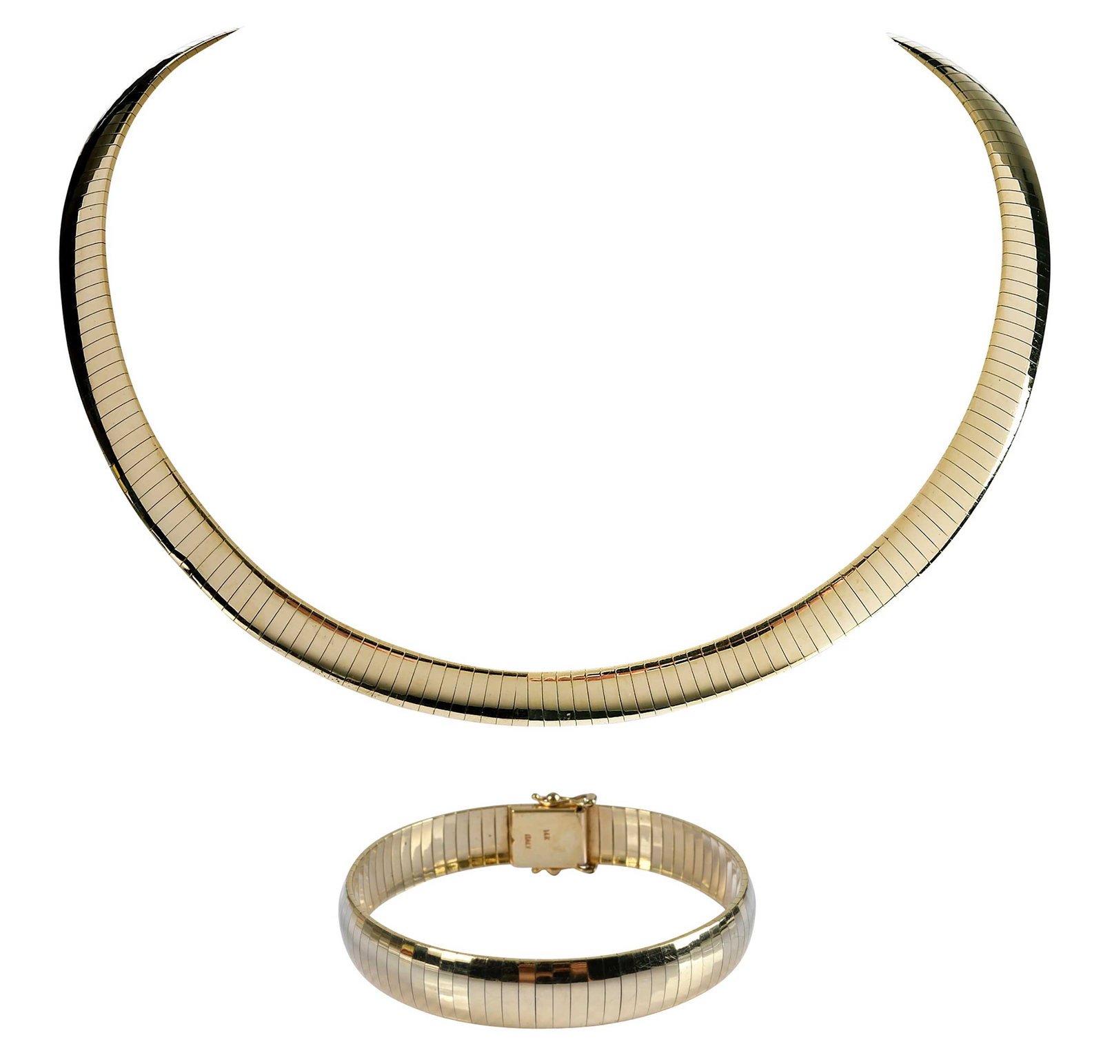 14kt. Wide Domed Omega Necklace and Bracelet Suite: high polish, 8.0mm wide, reversible, marked "14k", yellow gold, 16 in. length of chain, 7-1/2 in. length bracelet, 85.8 g Provenance: Private Collection Note: Brunk Auctions does not guarantee the acc