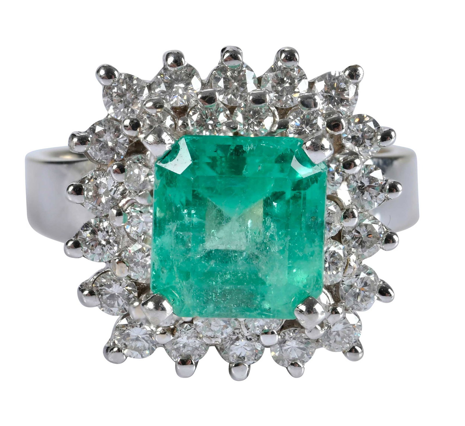 18kt. Emerald and Diamond Cocktail Ring: emerald cut emerald, approx. 4.00ct., 32 round faceted diamonds, approx., 1.60ctw., marked "18K", yellow and white gold, 9-1/4 ring sz., 12.0 g Provenance: Private Collection, Virginia Beach Note: Acc