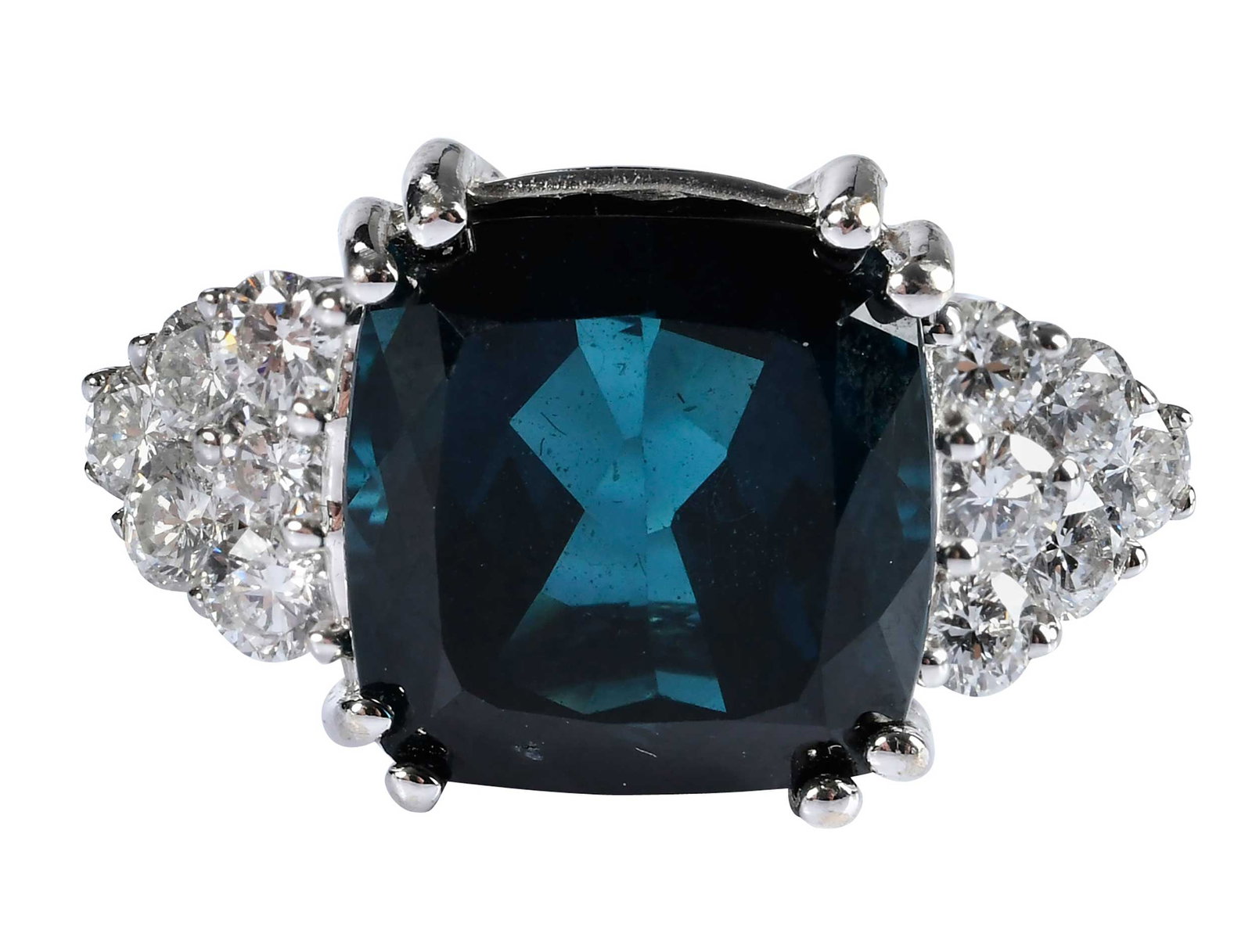 18kt. Indicolite Tourmaline and Diamond Ring: cushion cut indicolite tourmaline, approx. 9.00ct., 12 round faceted diamonds, approx. 1.10ctw., VS-SI, G-H, marked "18K", white gold, 8-1/2 ring sz., four double prongs, 8.7 g Provenance: Private Col