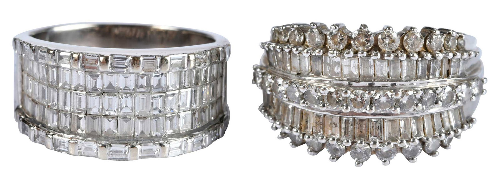 Two 14kt. Cigar Style Diamond Bands: full cut round faceted and baguette cut diamonds, I1-I2, H-J, cigar style, marked "14k", white gold, 8-1/2 and 9-3/4 ring sz., 17.7 g Provenance: Private Collection, Virginia Beach Note: Brunk Auction