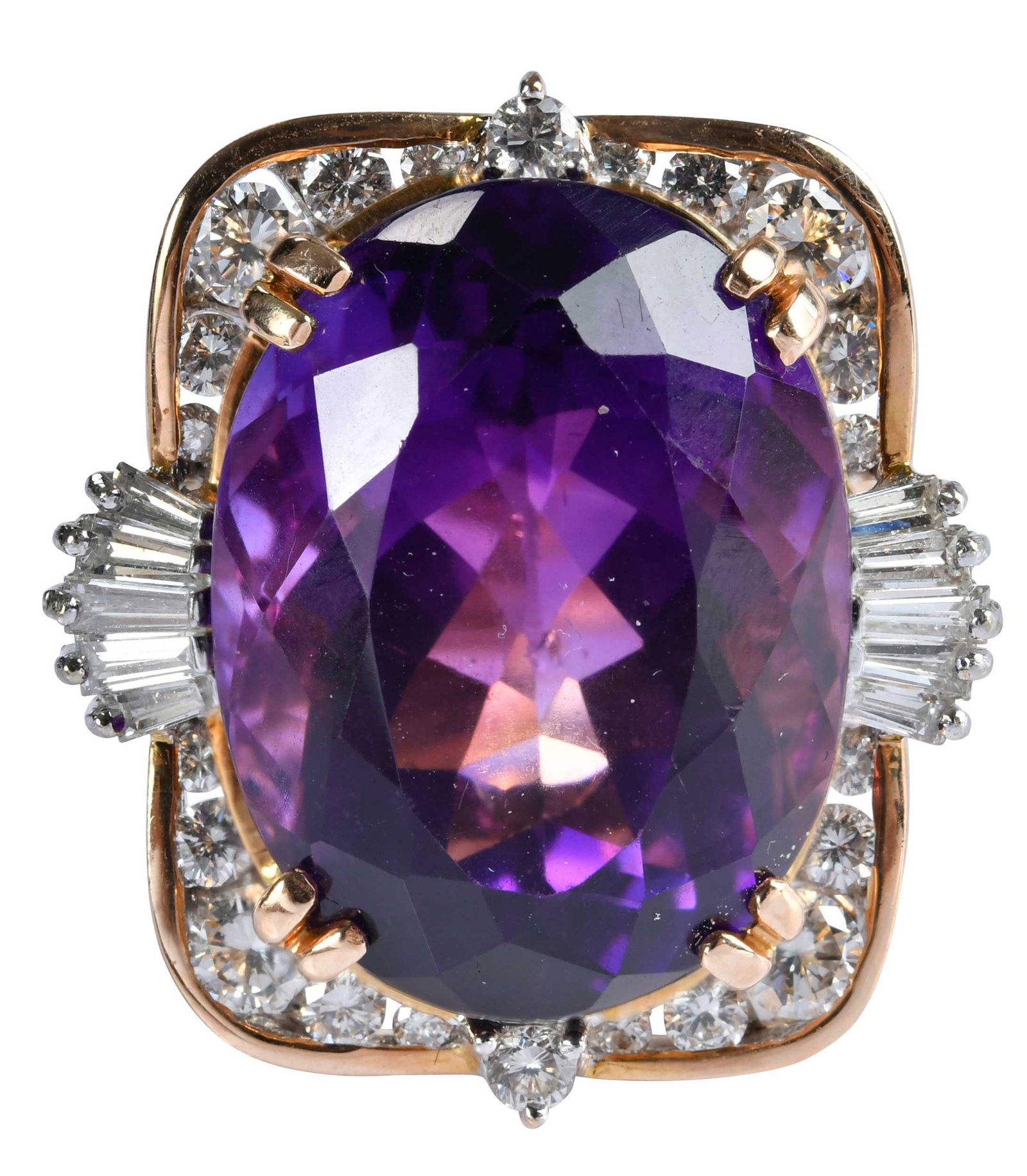 14kt. Amethyst and Diamond Cocktail Ring: oval faceted amethyst, approx. 23.30ct., tapered baguette and round faceted diamonds, approx. 1.60ctw., marked "585,14k", yellow gold, 10-1/2 ring sz., 15.5 g Provenance: Private Collection, Virginia 