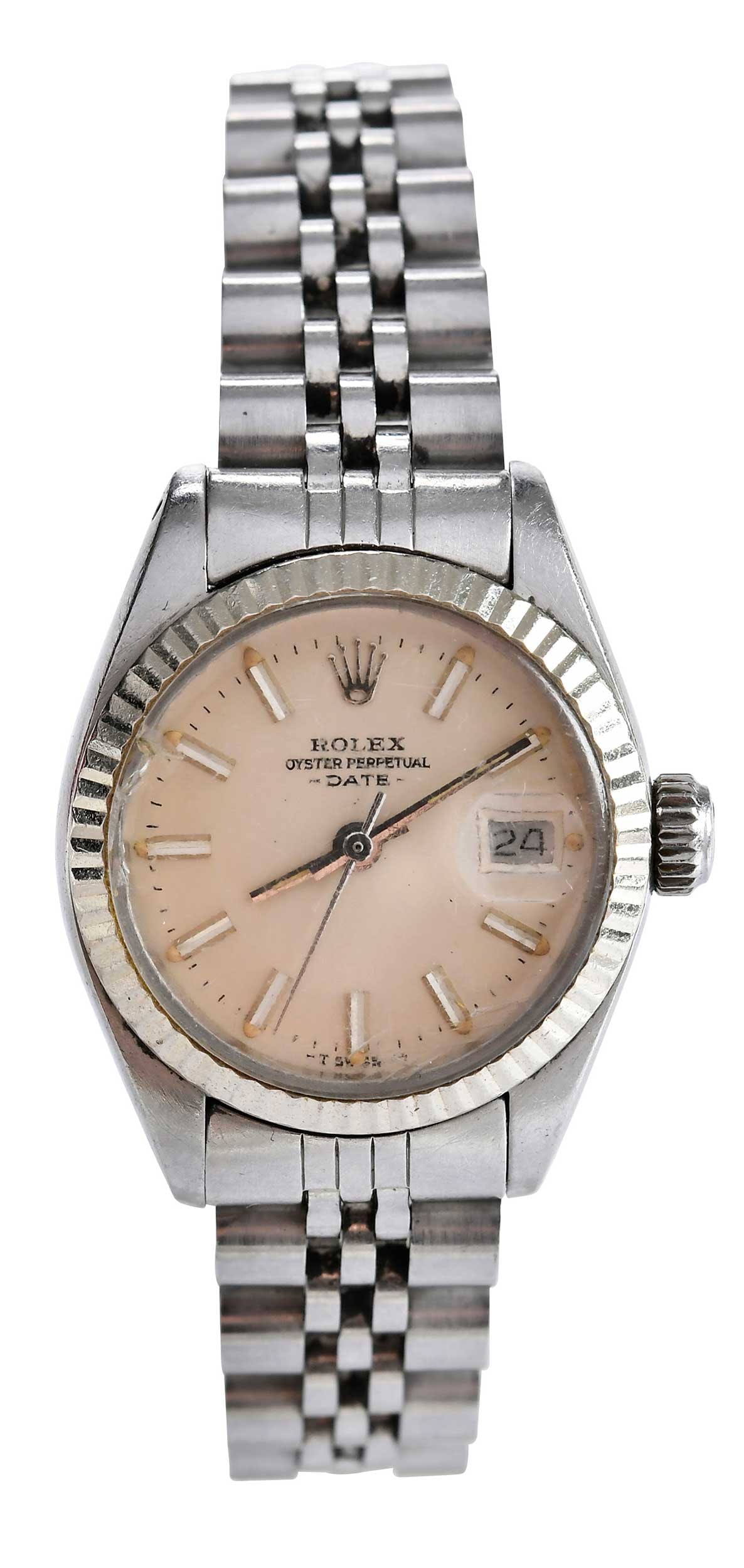 Vintage Rolex Oyster Perpetual Date Stainless Steel Watch: circa 1980, fluted bezel, 26mm oyster case, champagne dial, stick index hour markers, date cyclops at three, serial number 6011737, reference number 6917, stainless steel Jubilee bracelet, 6-1/2 insid