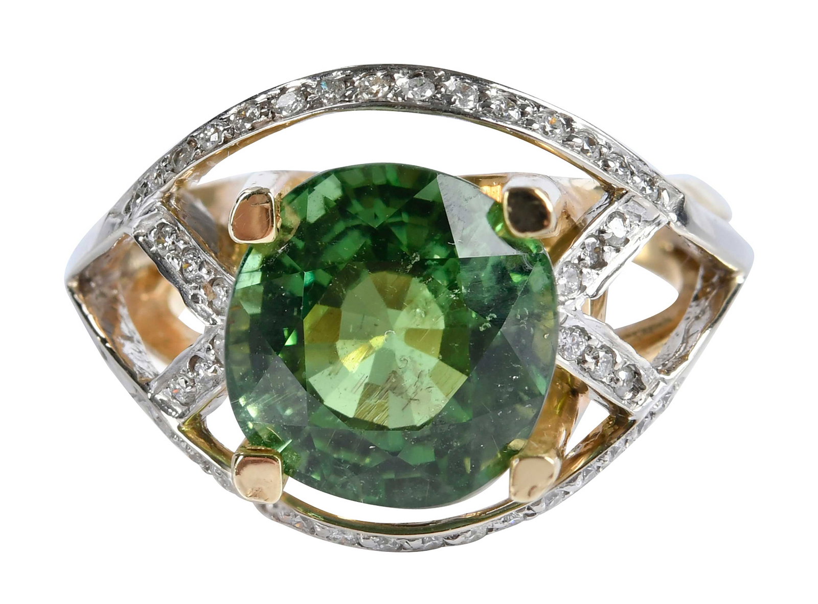 14kt. Tourmaline and Diamond Split Shank Ring: cushion cut faceted tourmaline, approx. 7.25ct., 44 round faceted diamonds, approx.0.30ctw., marked "14K", yellow gold, 8-1/2 ring sz., 11.0 g Provenance: Private Collection, Virginia Beach Note: Acco