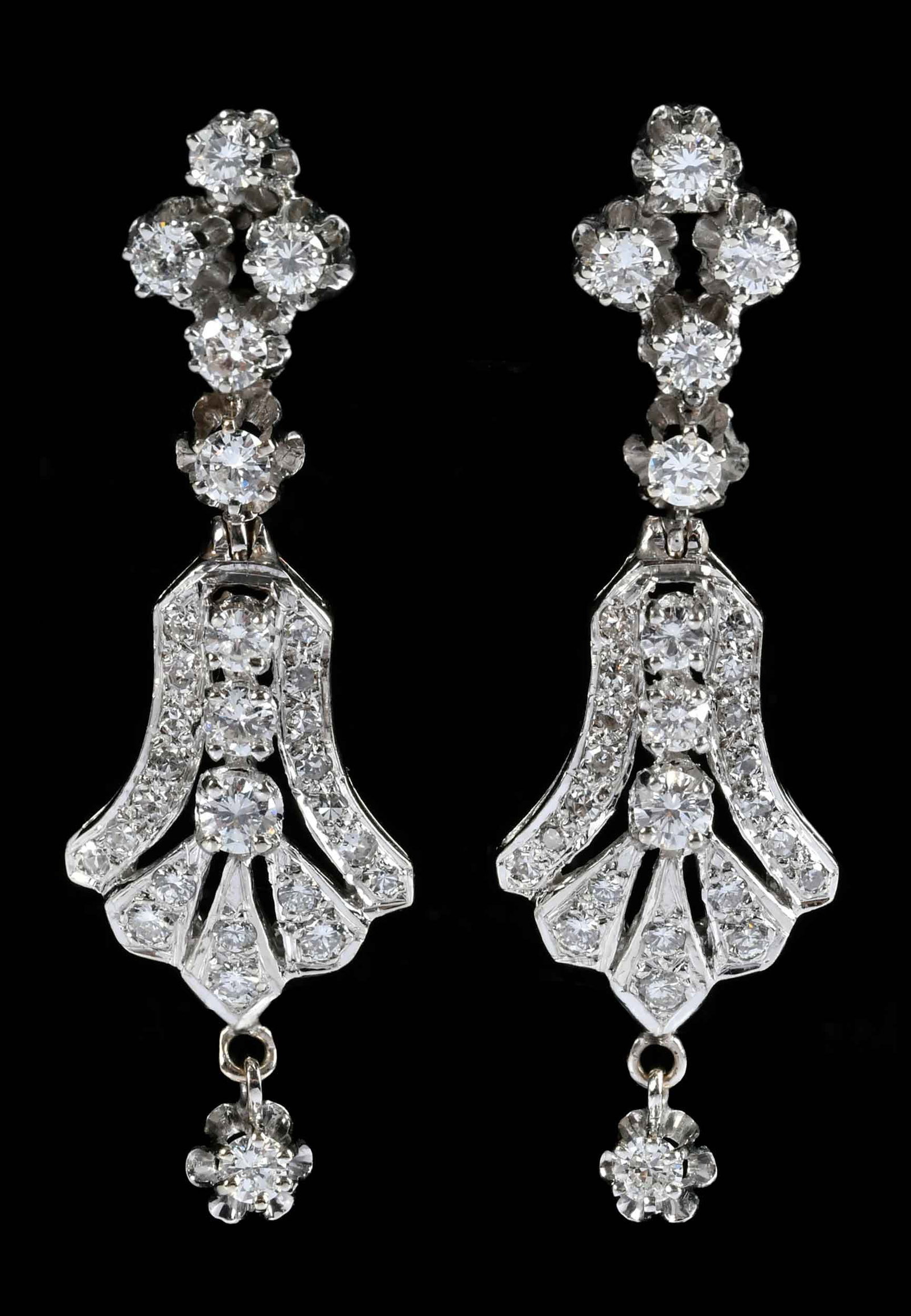 14kt. Chandelier Style Diamond Earrings: 18 round faceted diamonds, 40 round single cut diamonds, approx. 2.15ctw., tests 14kt. white gold, post backs test 18kt. white gold, 1-3/4 in. length, 9.5 g Provenance: Private Collection, Virginia Be