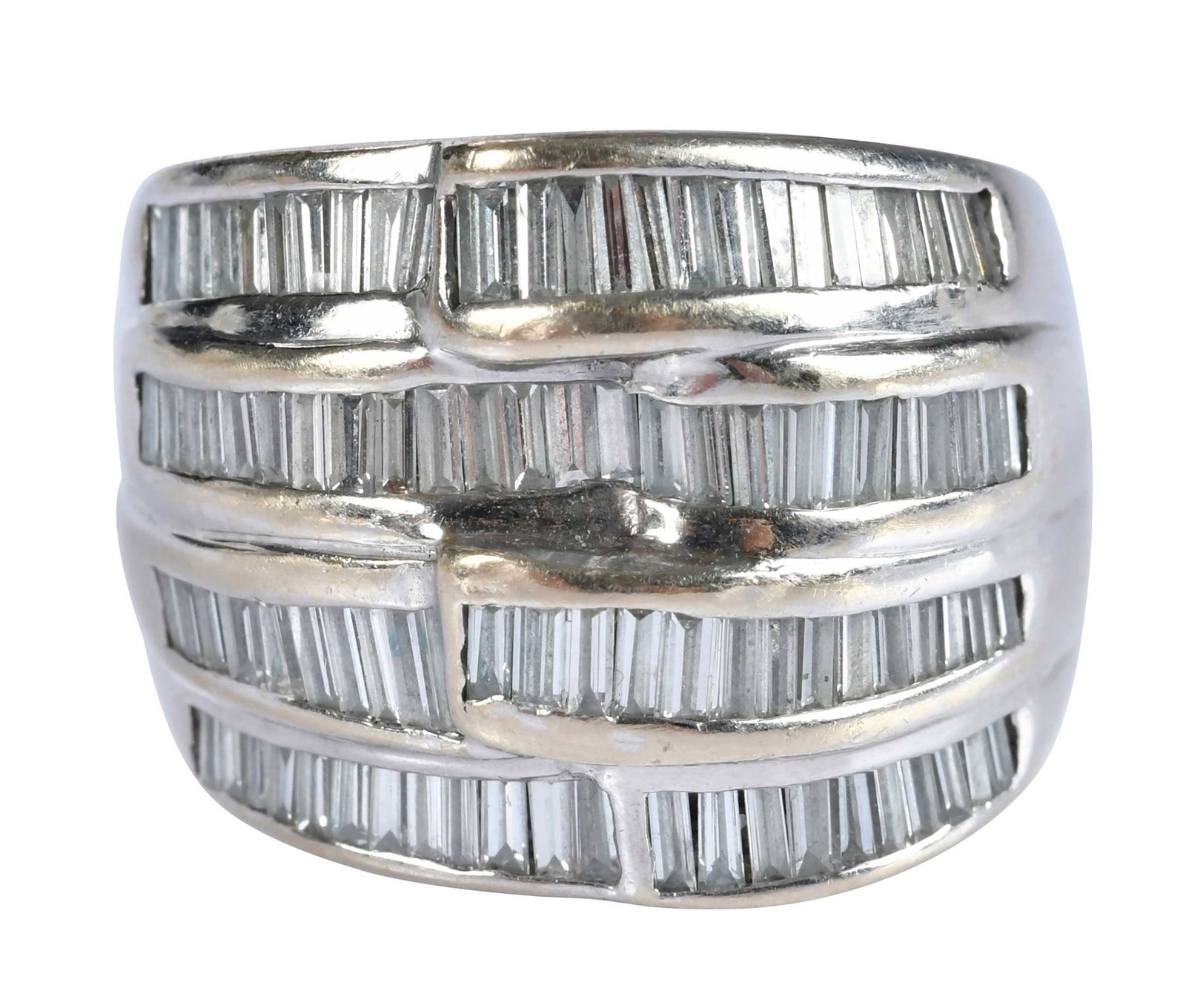 18kt. Wide Vertical Baguette Channel Set Diamond Ring: four rows of straight and tapered baguette cut diamonds, VS-SI, G-I, approx. 3.00ctw., marked "18K", white gold, maker's mark, 9-1/4 ring sz., 18.0mm at widest area, 19.2 g Provenance: Charlottesville